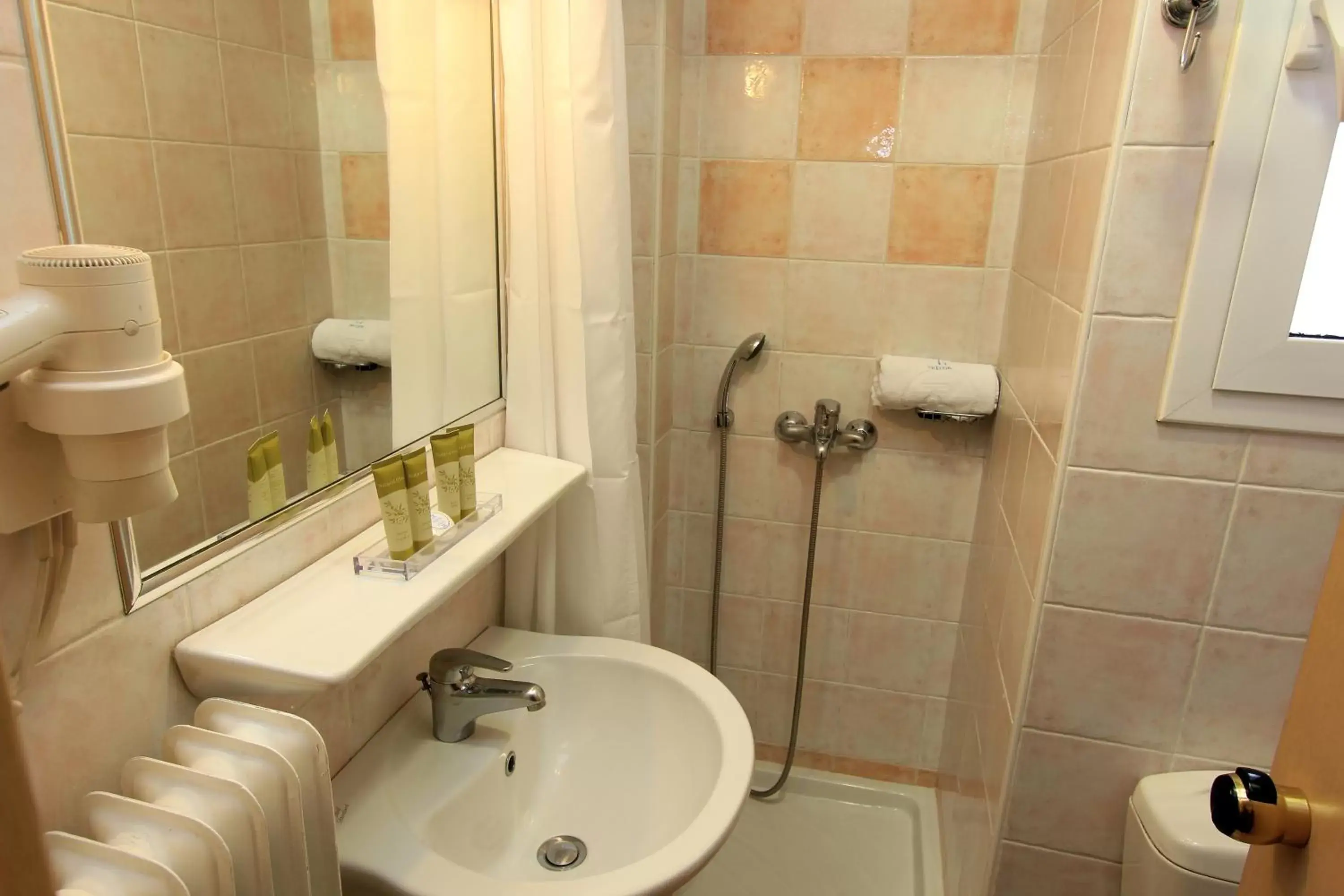 Bathroom in Triton Hotel Piraeus