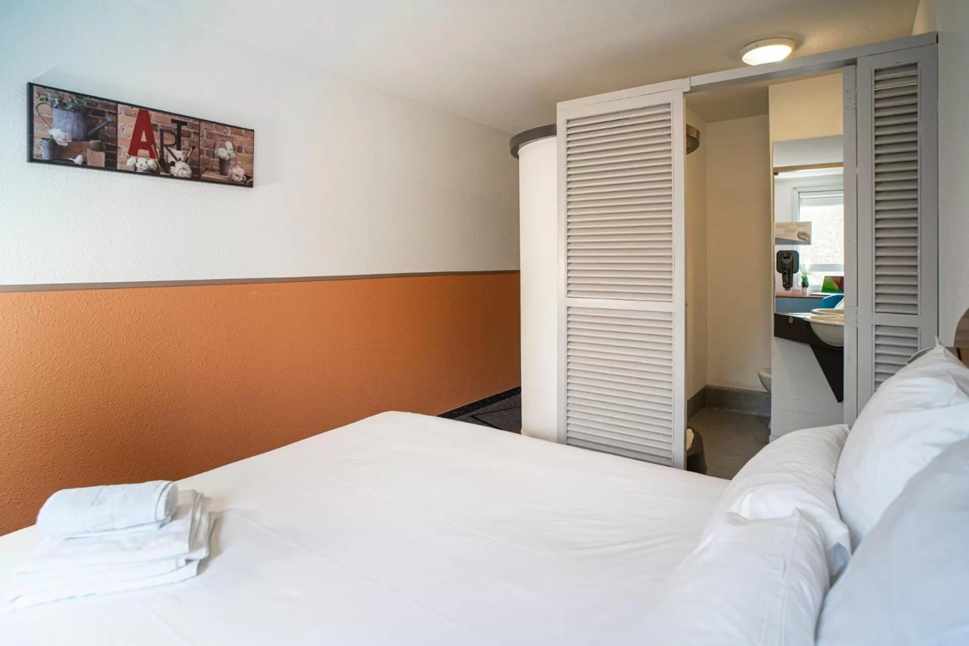 Bed in Quick Palace Pau Zénith