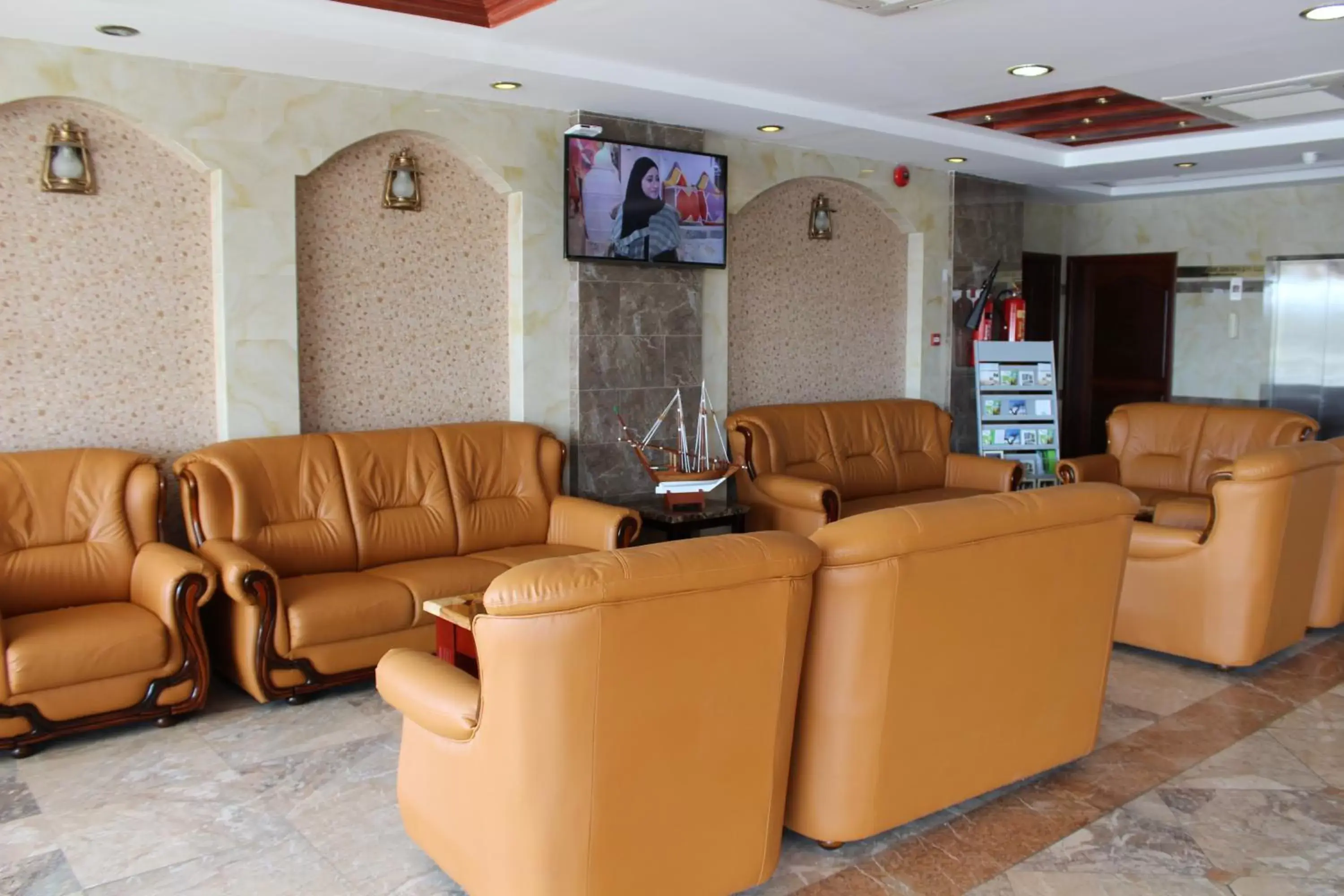 Communal lounge/ TV room, Lobby/Reception in Nizwa Hotel Apartments