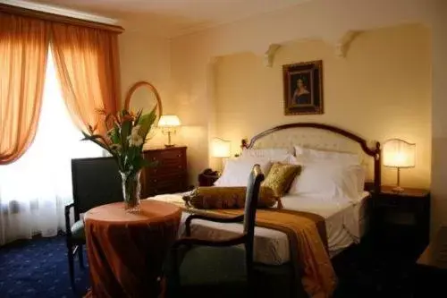 Bed in Grand Hotel Palace