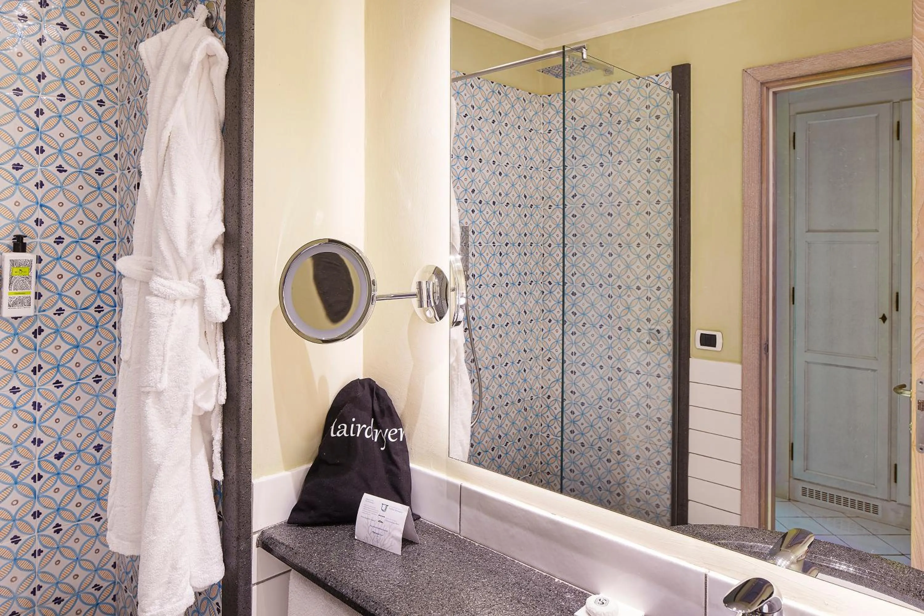 Bathroom in Therasia Resort Sea and SPA - The Leading Hotels of the World