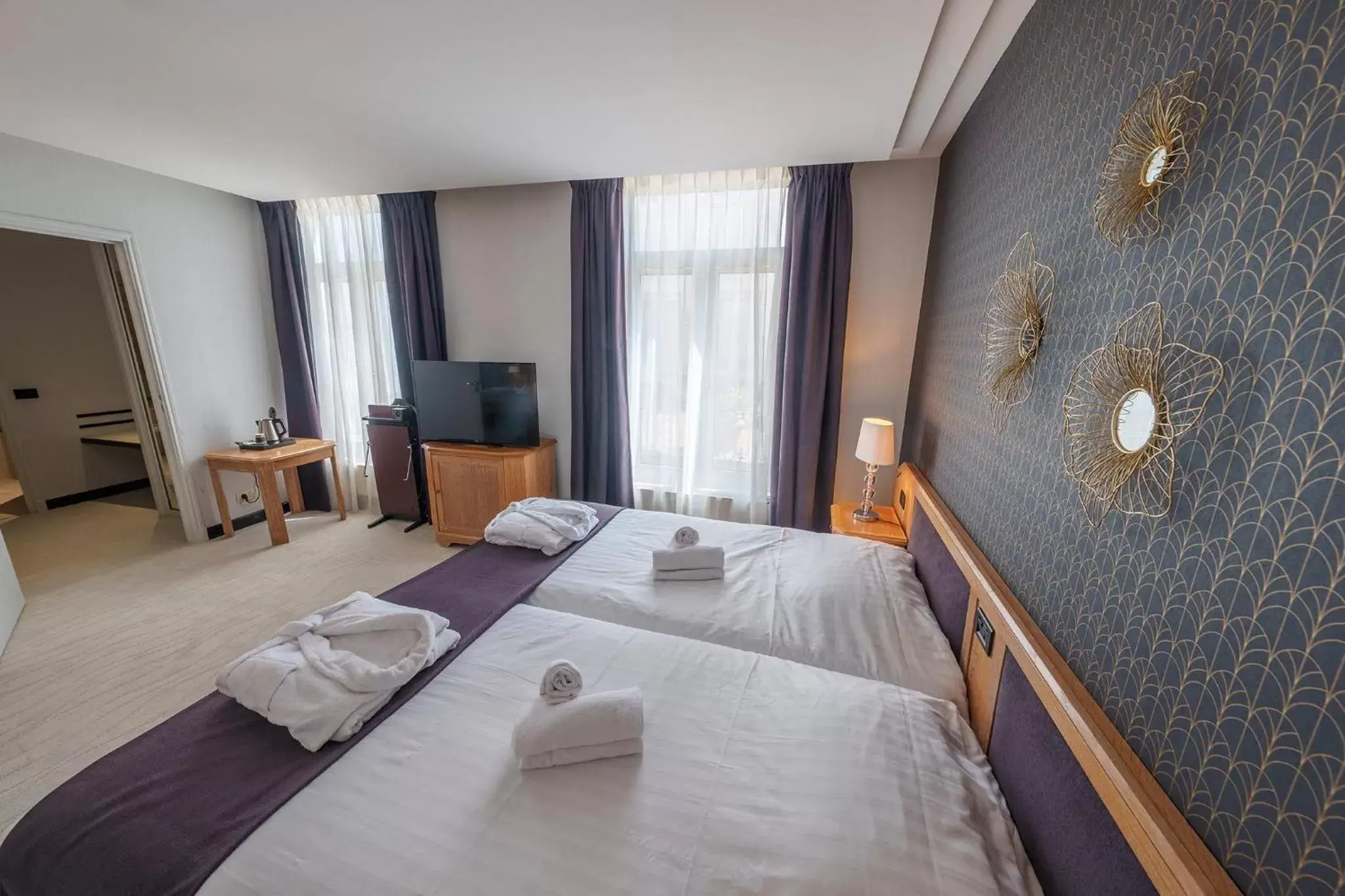 Bedroom in Hôtel Le Picardy