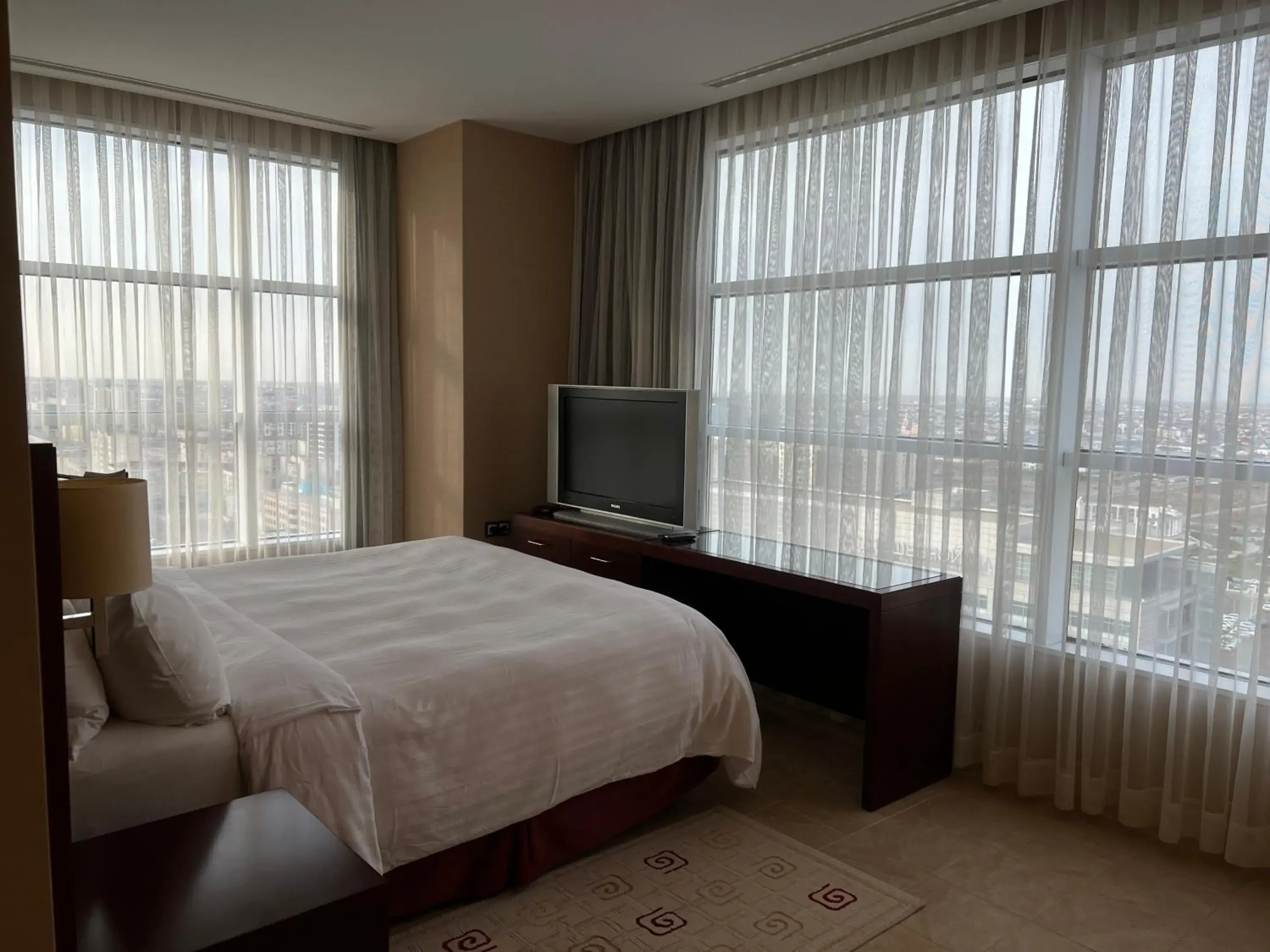 Bed in Marriott Executive Apartments Atyrau