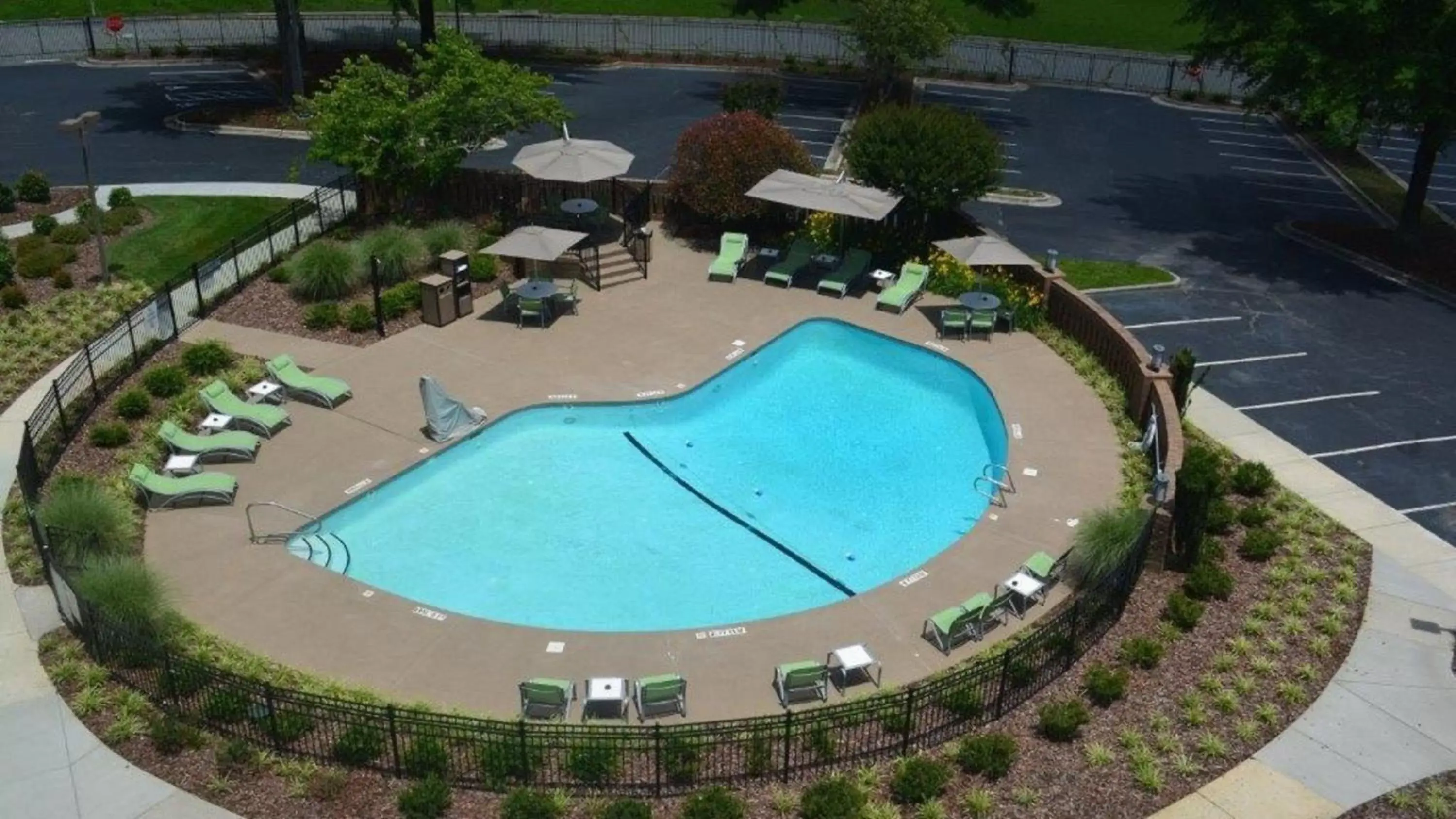 Swimming pool, Pool View in Holiday Inn Greensboro Coliseum, an IHG Hotel
