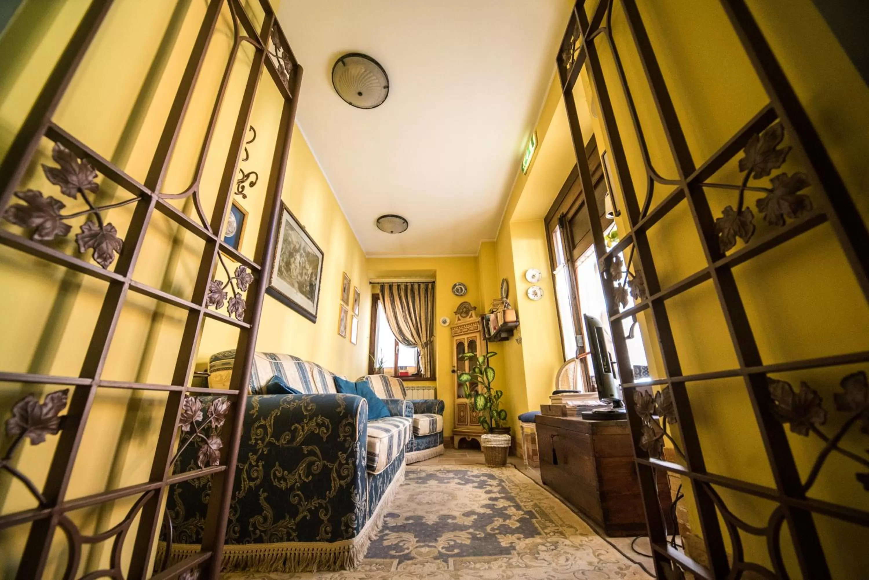 Communal lounge/ TV room, Bed in Hotel Il Tiglio