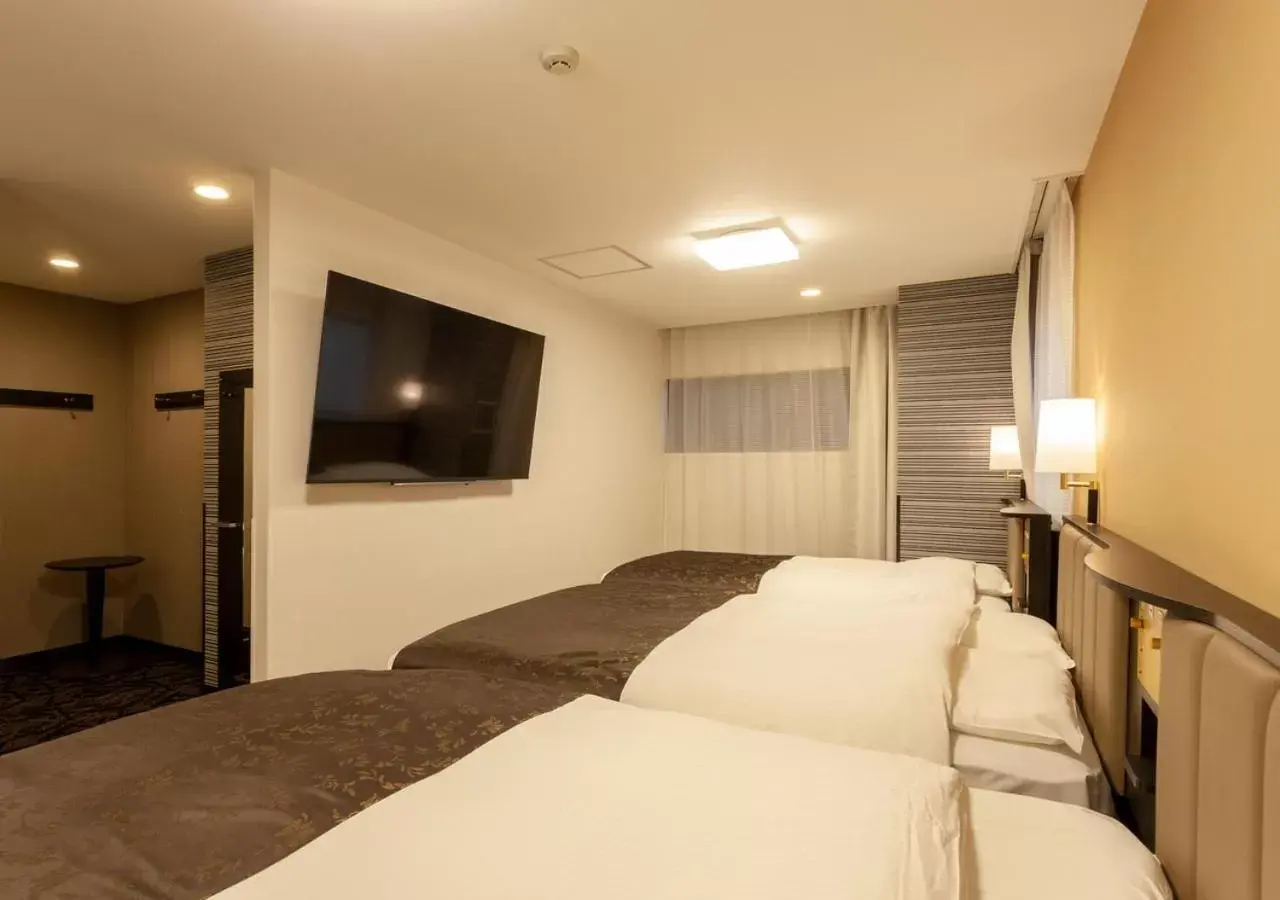 Photo of the whole room, Bed in APA Hotel Saga Ekimae Chuo