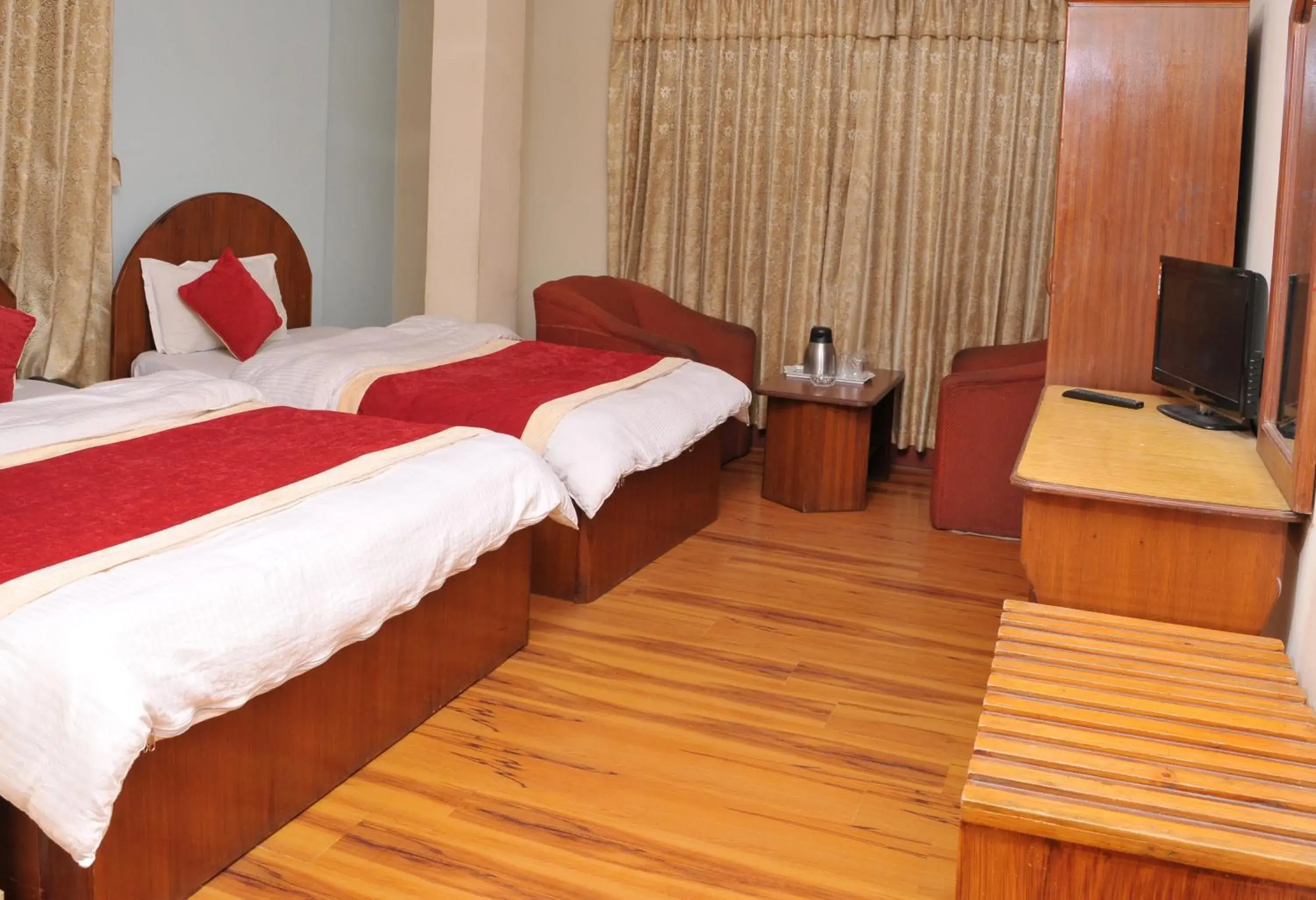 Photo of the whole room, Bed in Hotel Brihaspati