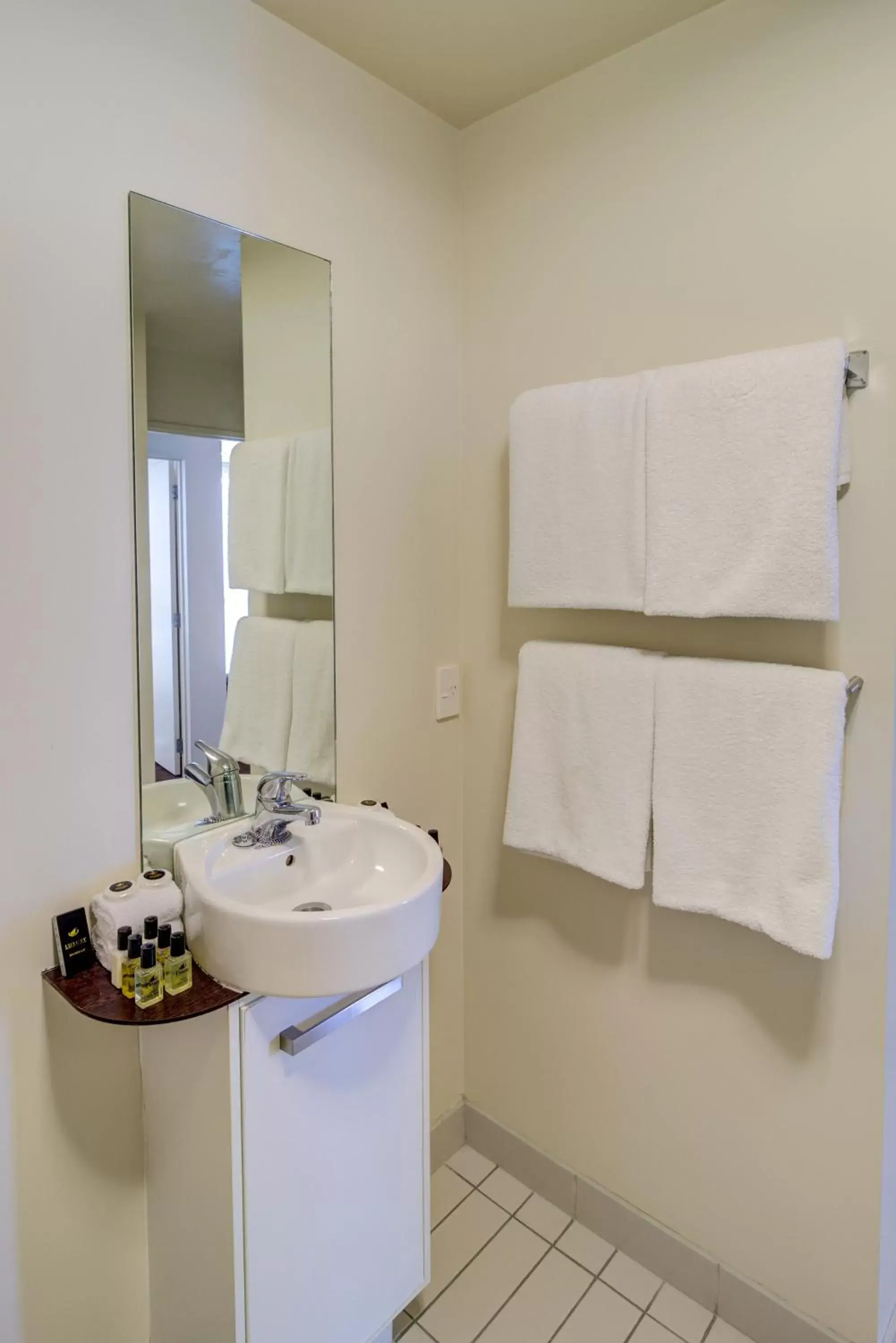 Bathroom in The Quadrant Hotel & Suites