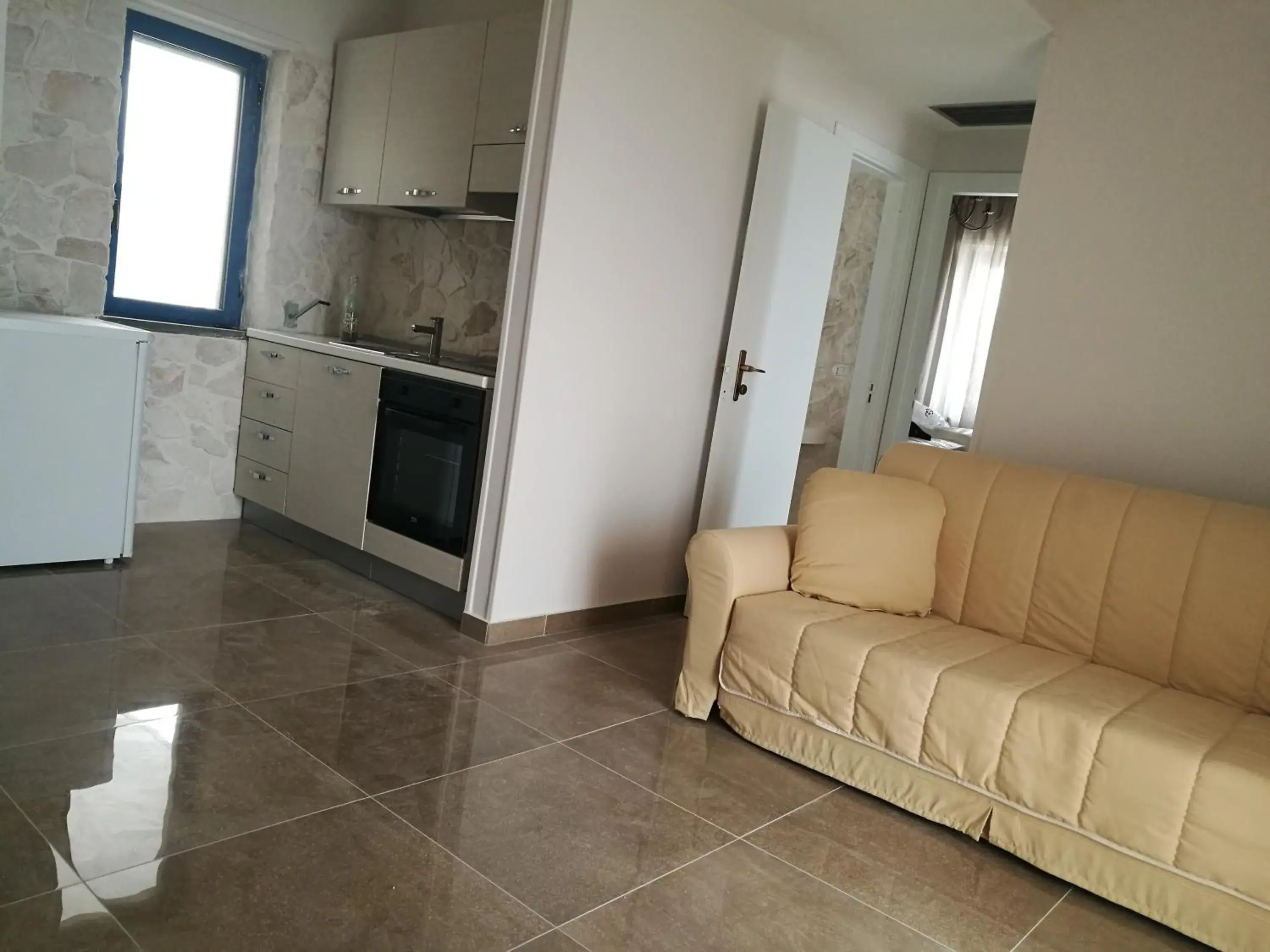 Kitchen or kitchenette, Seating Area in Hotel Residence La Corvetta