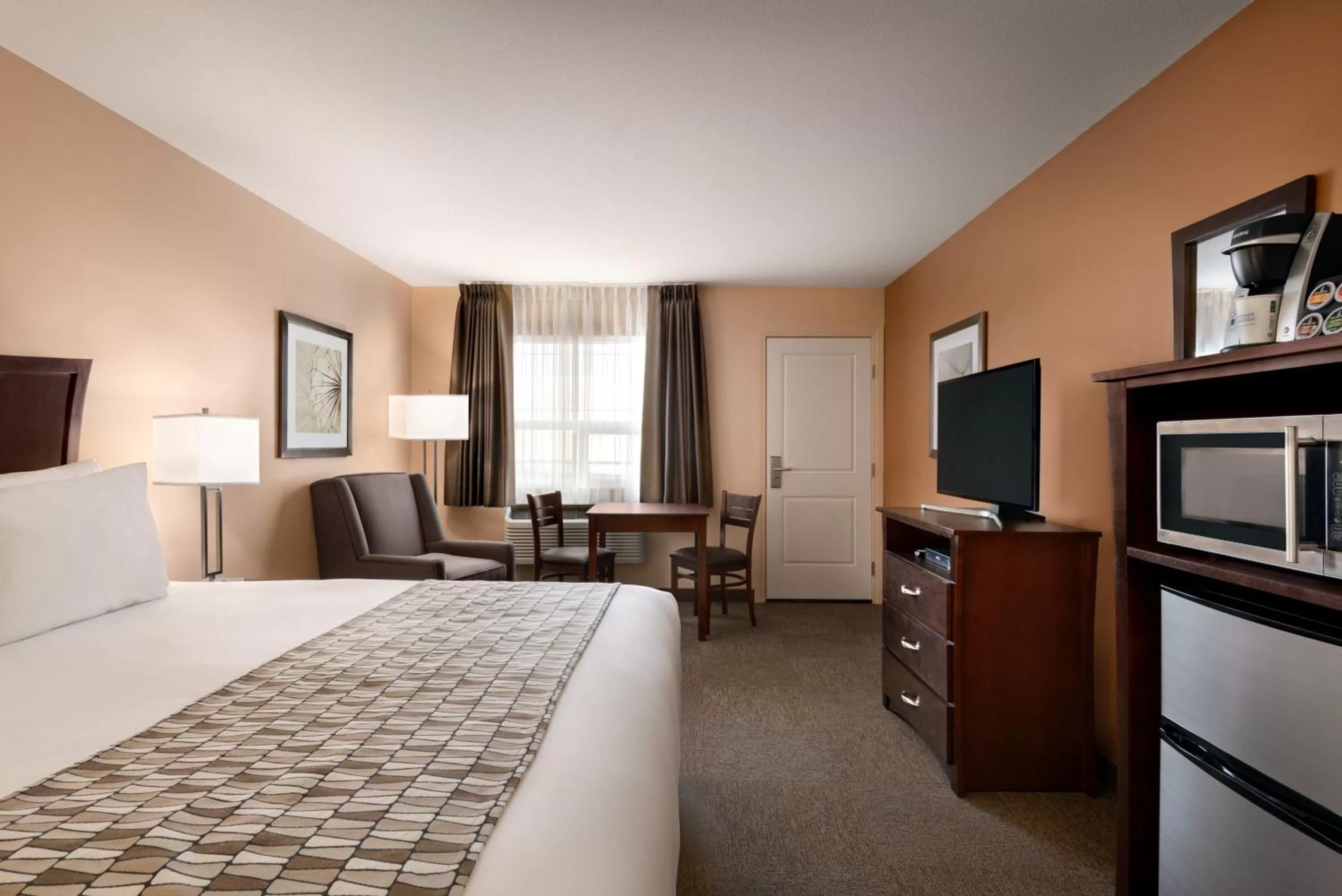 Bed in Travelodge by Wyndham Pincher Creek