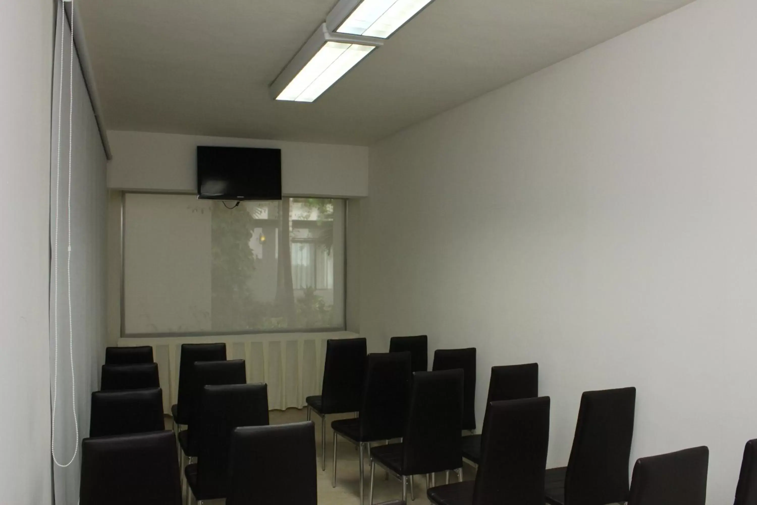 Meeting/conference room, TV/Entertainment Center in Ambiance Suites