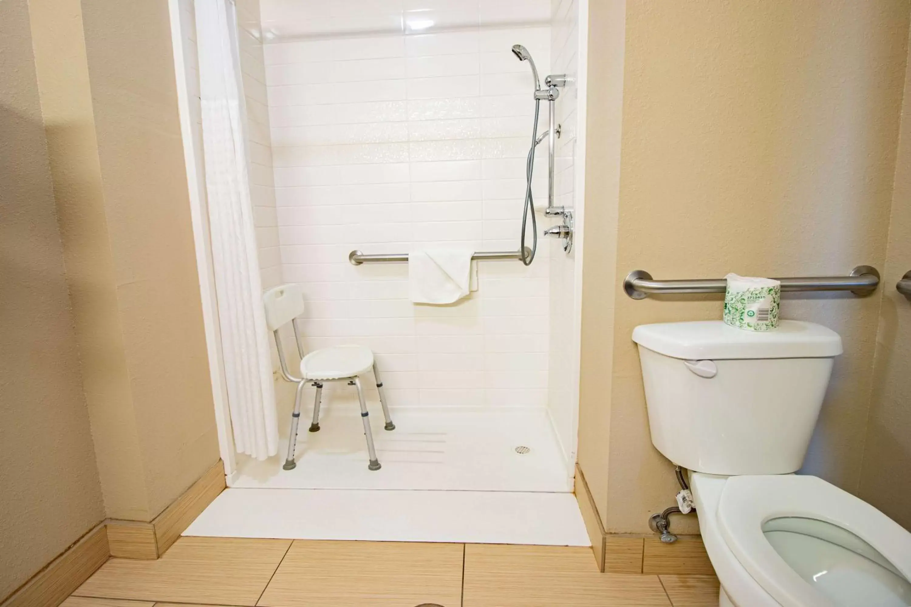 Bathroom in SureStay Plus Hotel by Best Western Owasso Tulsa North