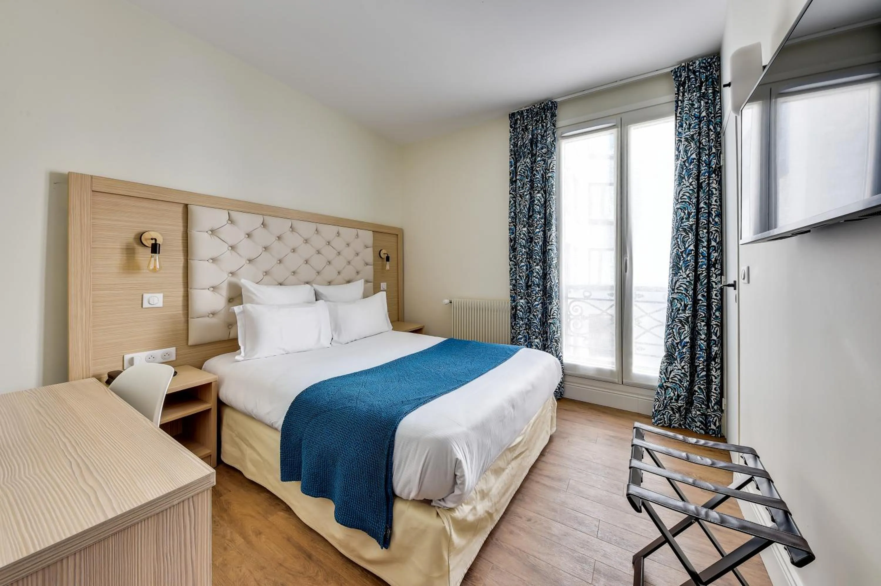 Bed in Hôtel Alexandrine Opera