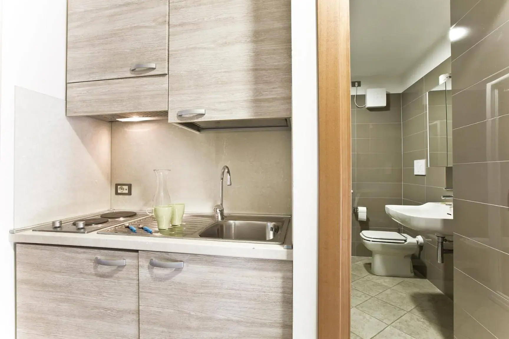 Kitchen or kitchenette, Bathroom in Hotel Belvedere