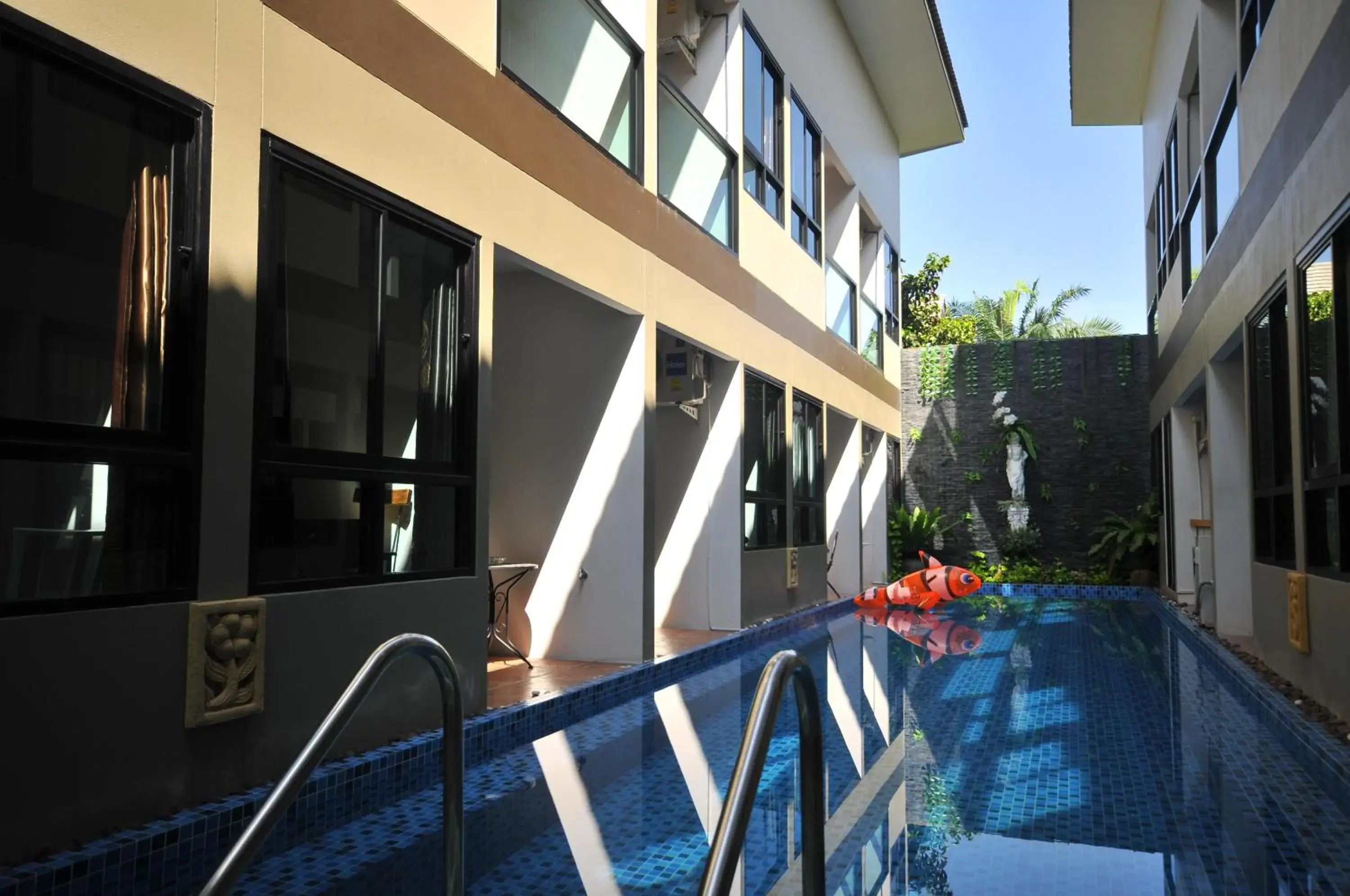 Property building, Swimming Pool in The Pool Resort