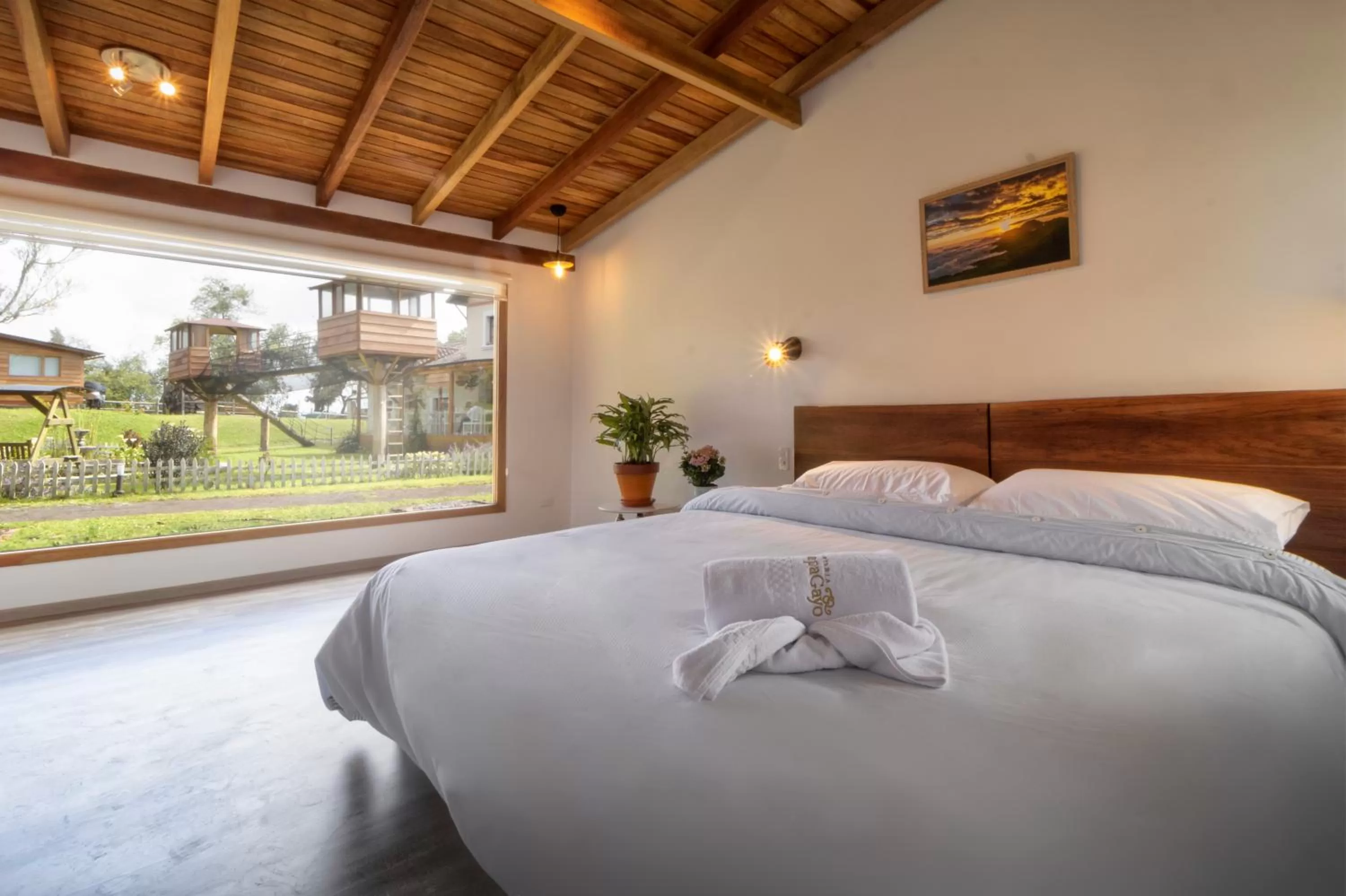 Bed in Hosteria Papagayo Cotopaxi
