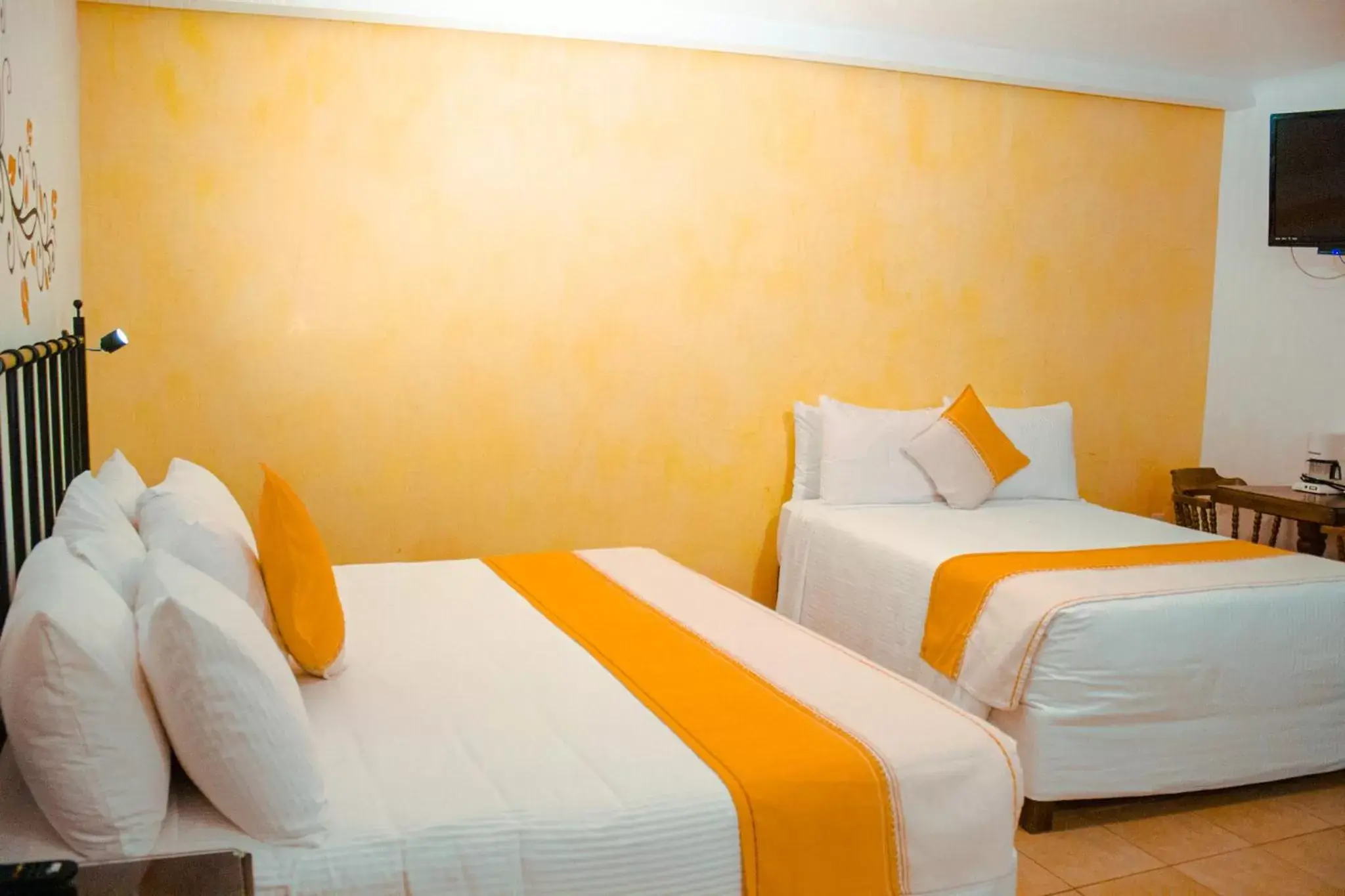 Bed in Hotel Oaxaca Real