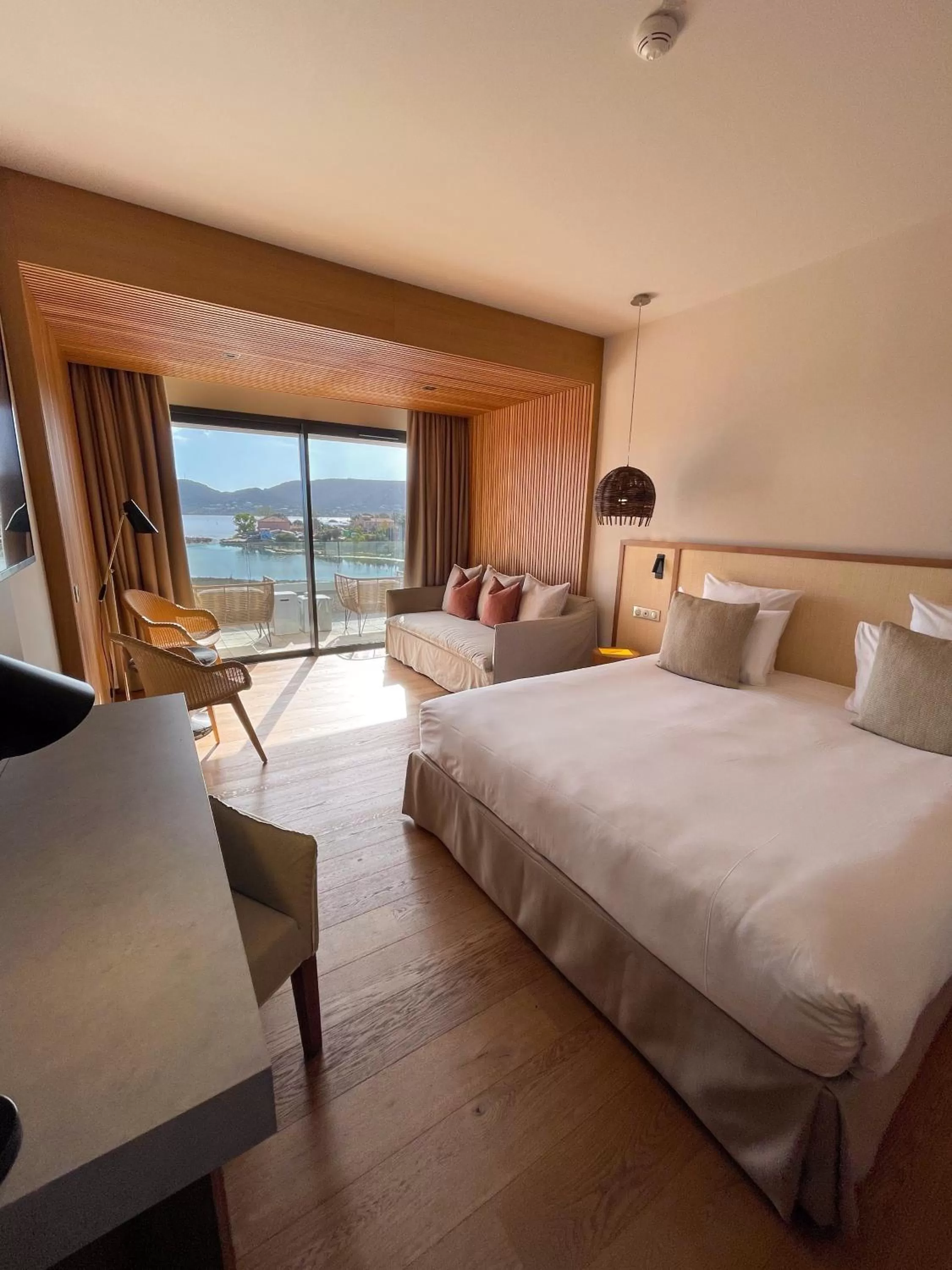 Photo of the whole room, Bed in Golden Tulip Porto-Vecchio