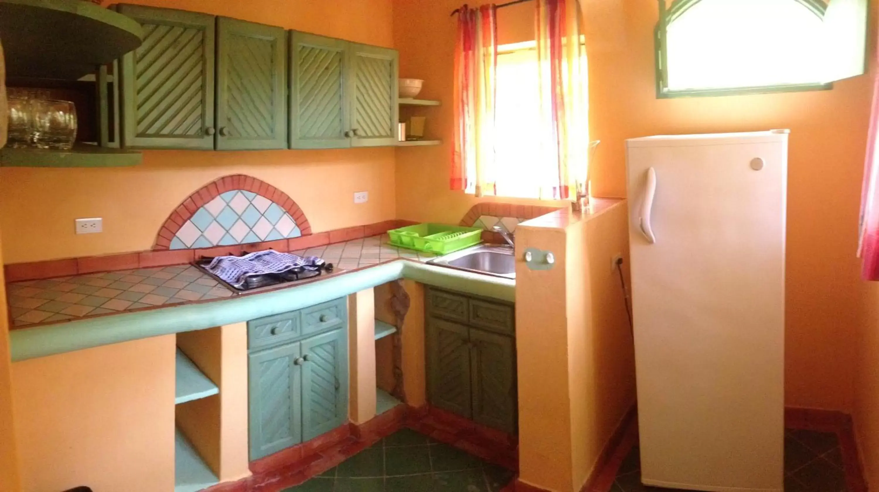 Kitchen/Kitchenette in Hotel - Residencial Madrugada