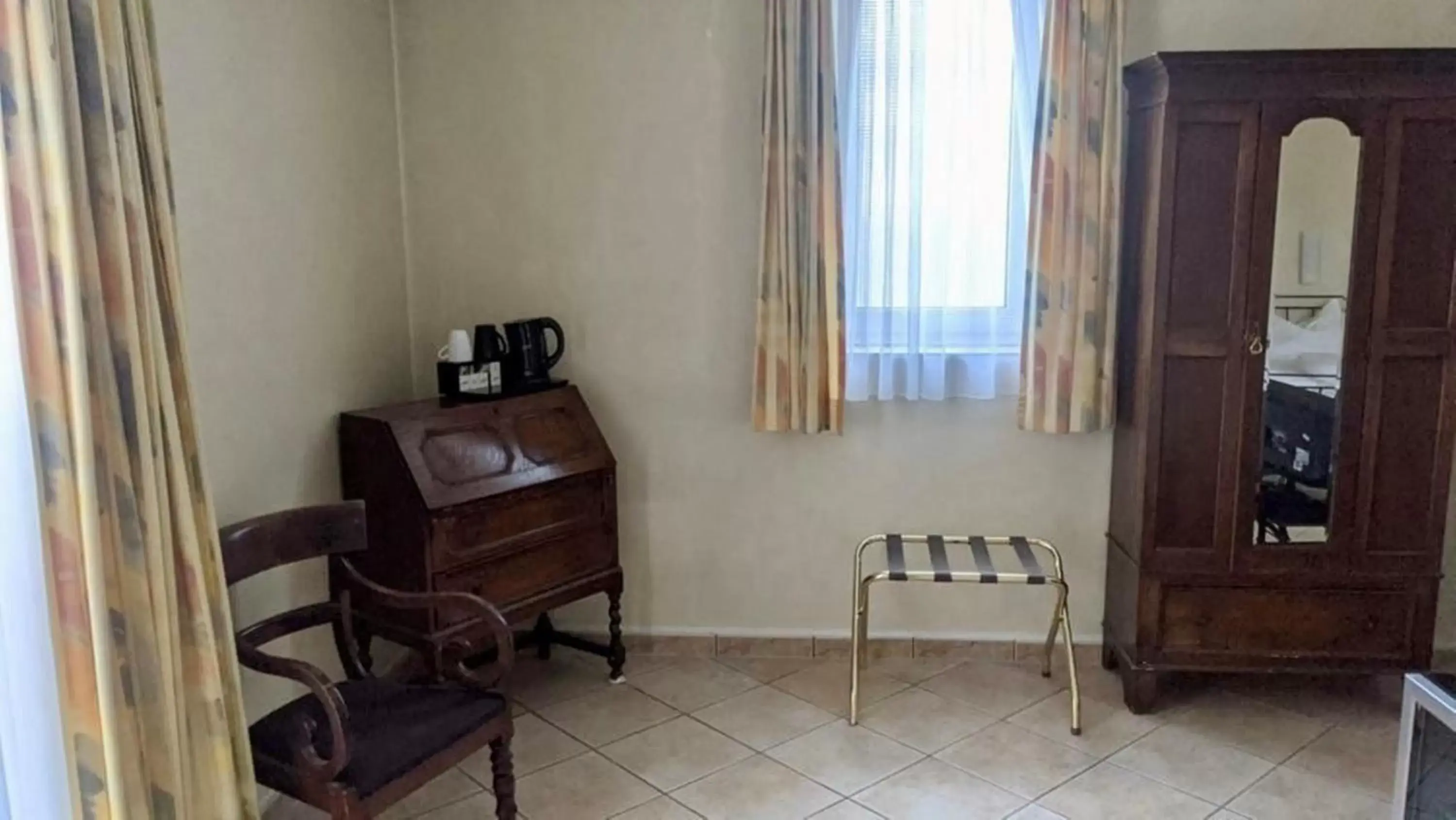 Seating area, TV/Entertainment Center in Trip Inn PostHotel Düren