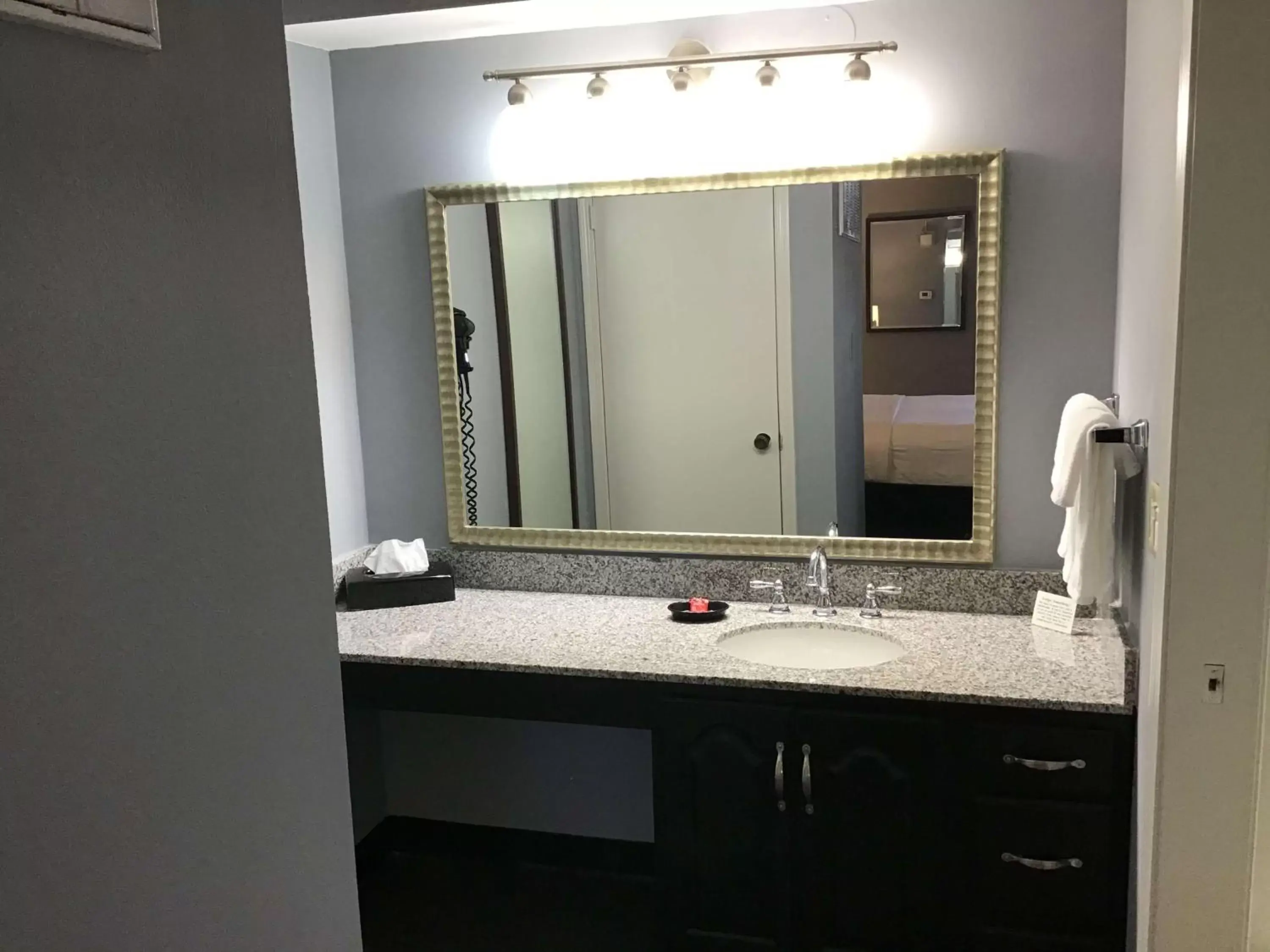 Bathroom in SureStay Studio by Best Western Pensacola