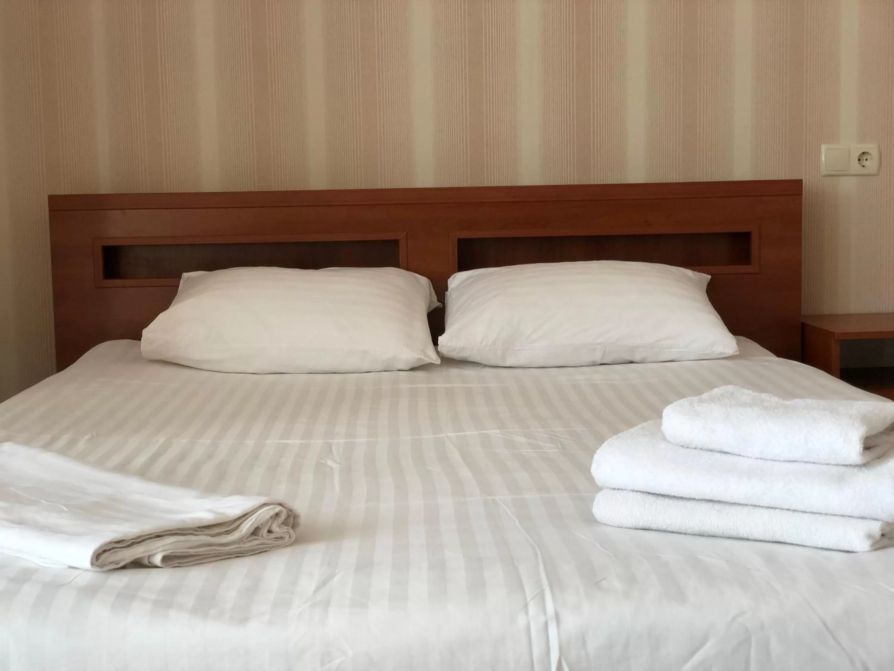 Bed in Zhuliany City Hotel