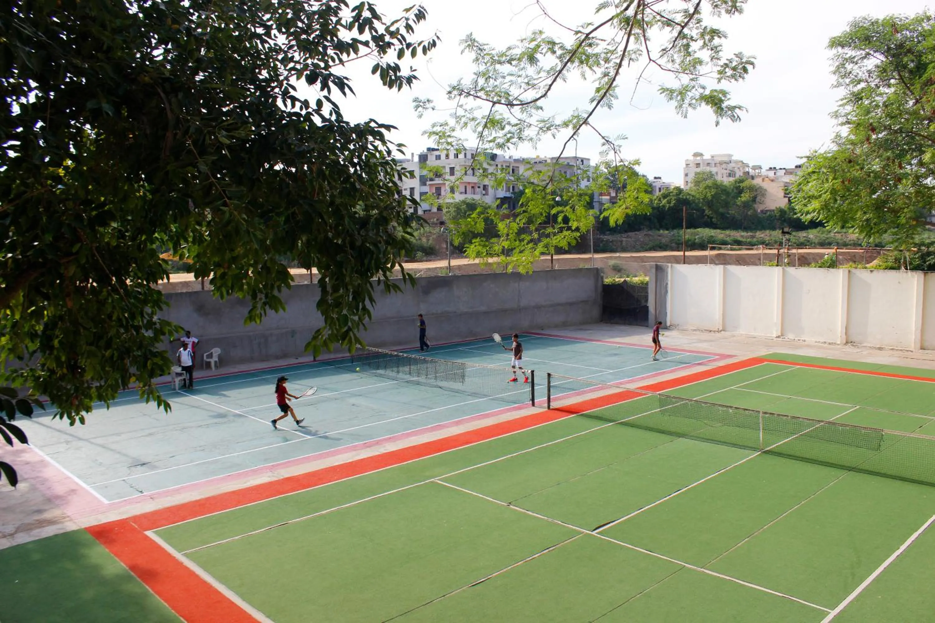 Tennis court in The Byke Grassfield Resort with Outdoor Pool, Shyam Nagar, Jaipur