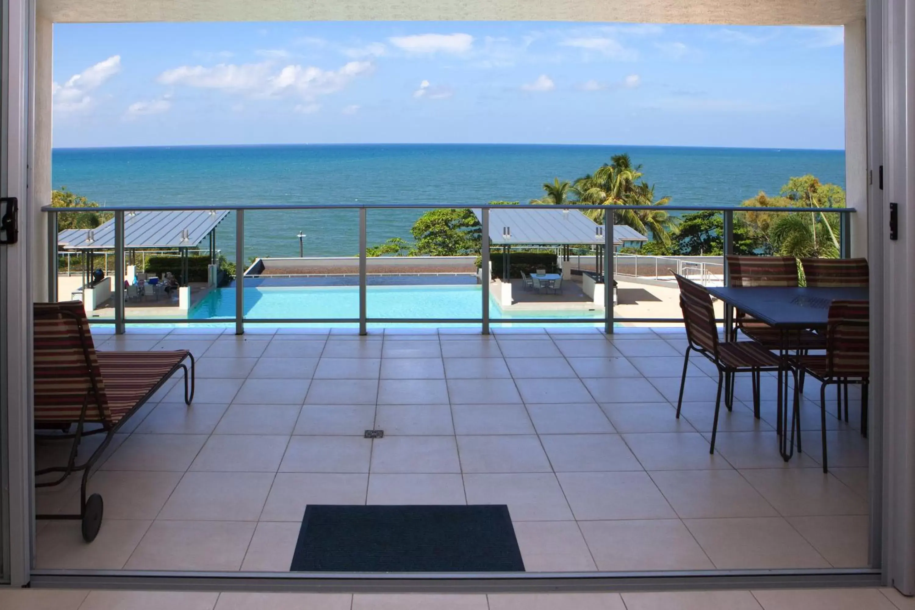 Balcony/Terrace, Swimming Pool in Vue Apartments Trinity Beach