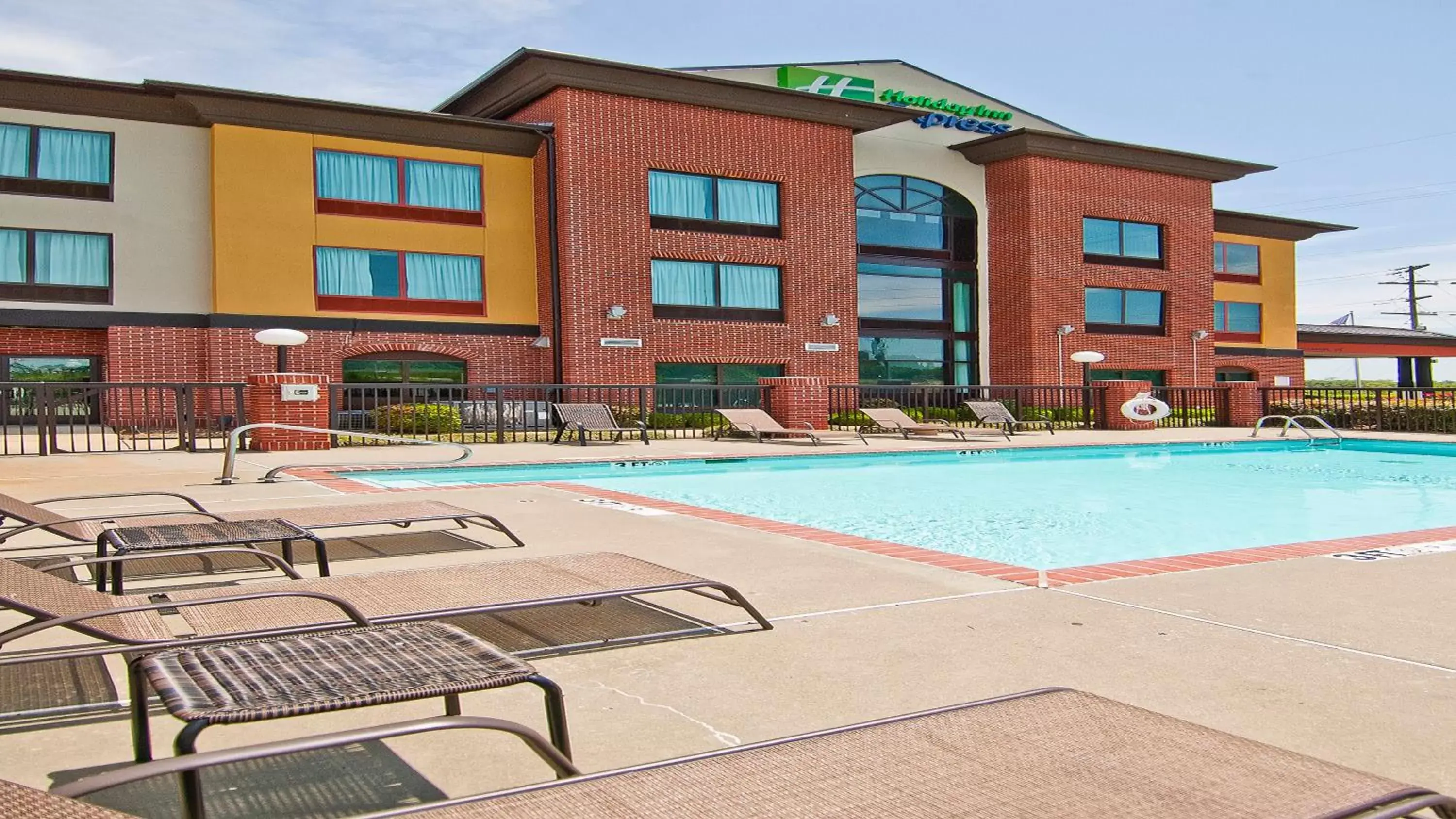 Swimming pool, Property Building in Holiday Inn Express Hotel & Suites Olive Branch, an IHG Hotel