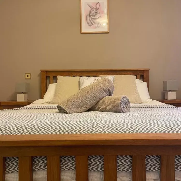 Bed in The Cottage Inn