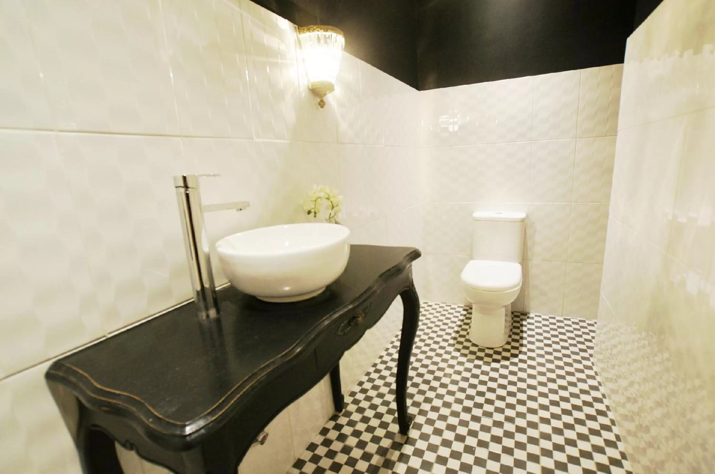 Bathroom in Quiral Hotel Boutique