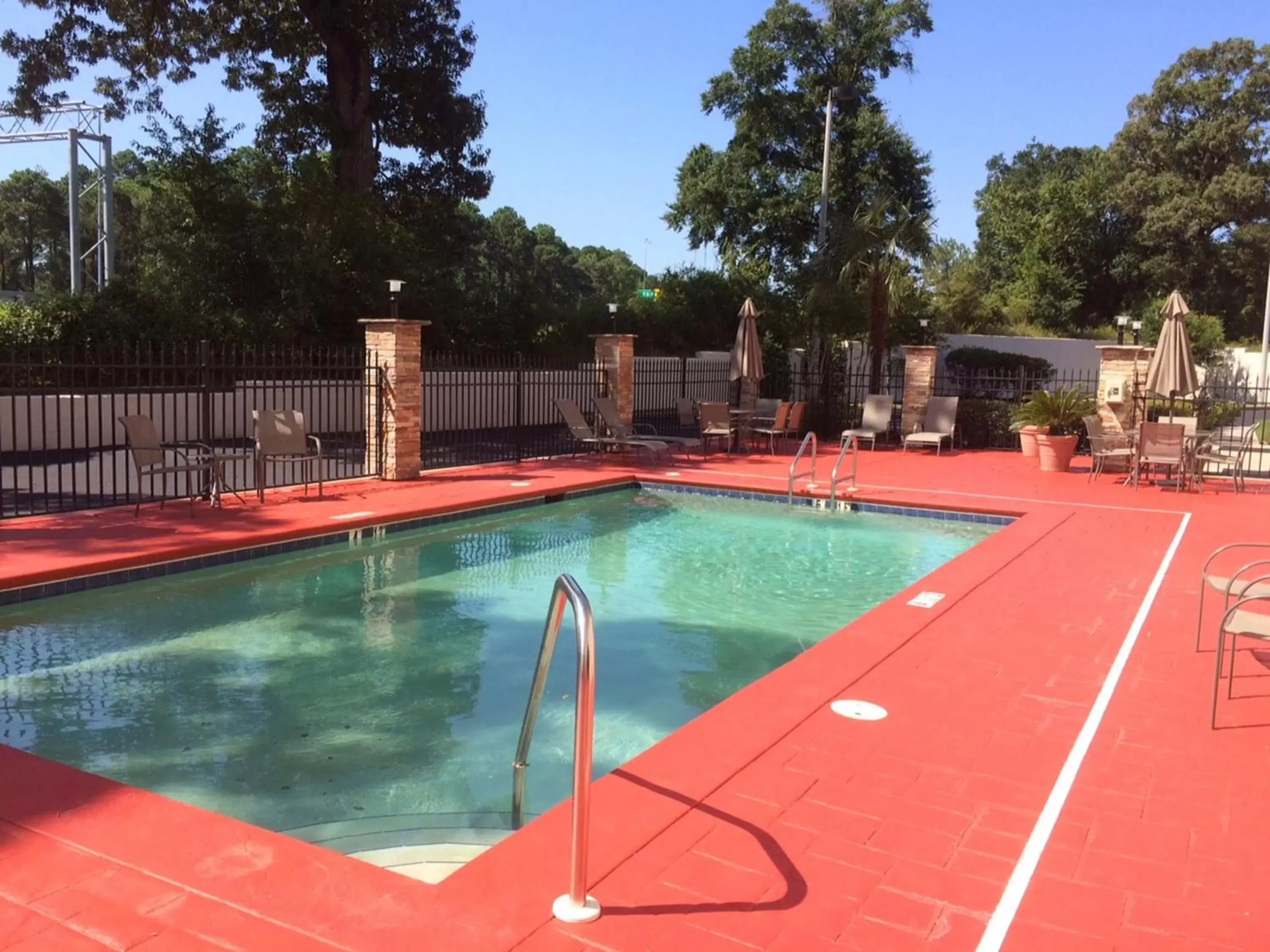 Swimming Pool in Holiday Inn Express & Suites Mobile West I-10, an IHG Hotel