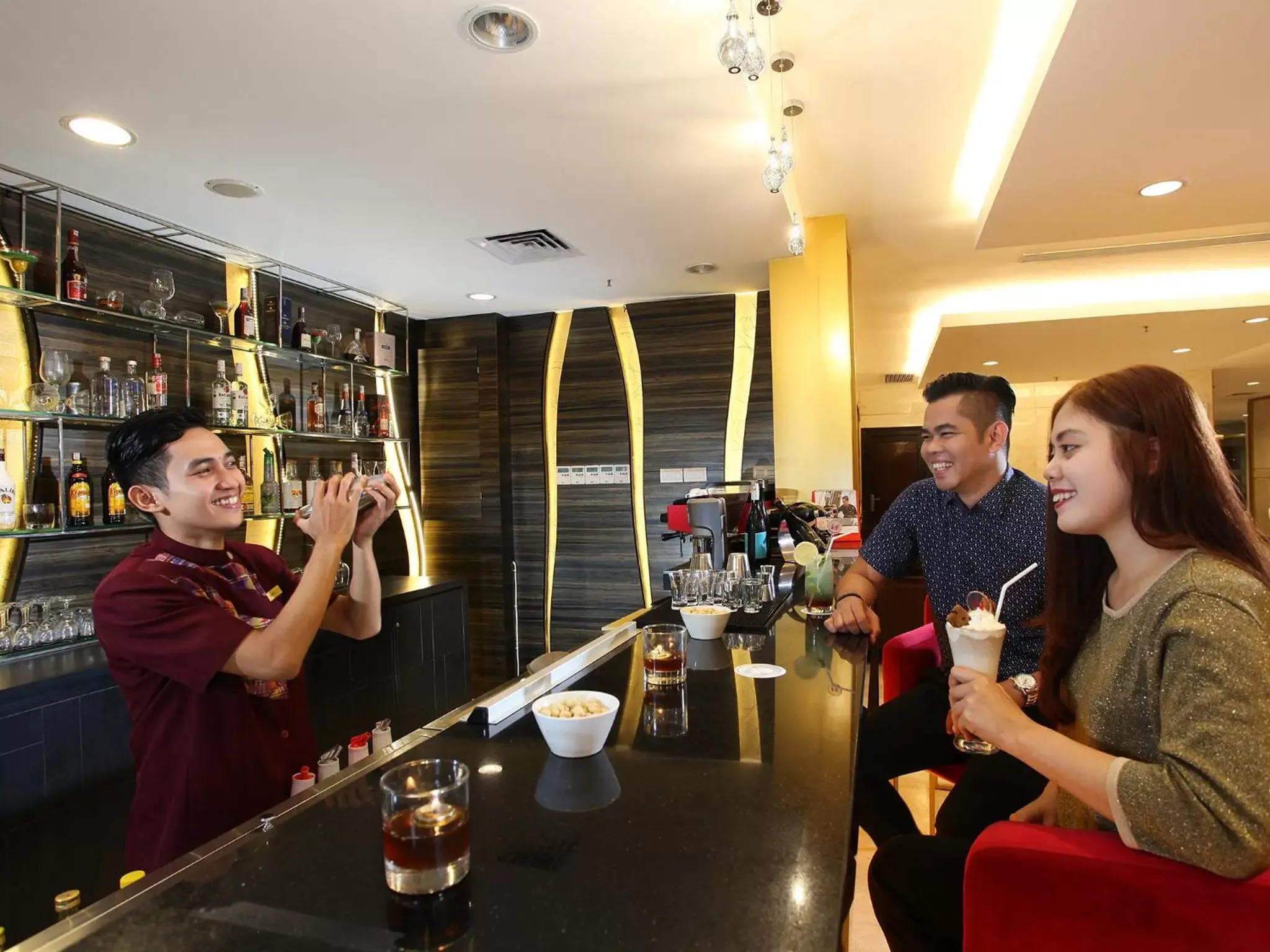 Lounge or bar in Swiss-Belhotel Makassar