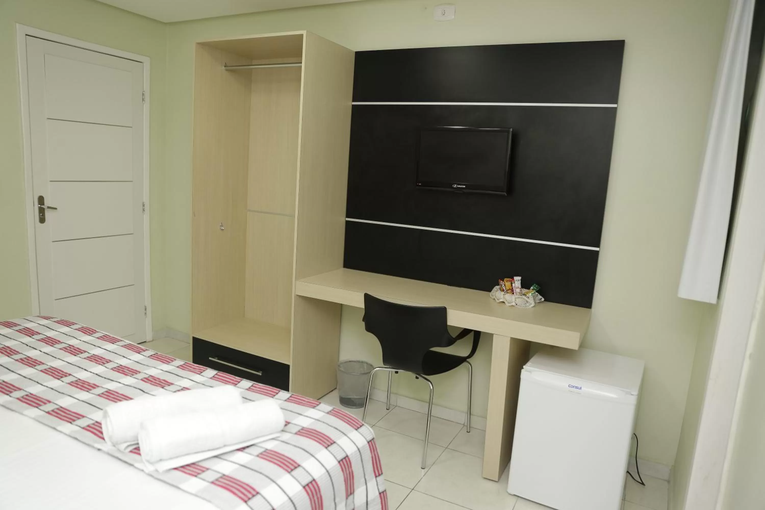 Photo of the whole room, Bed in LW Hotel