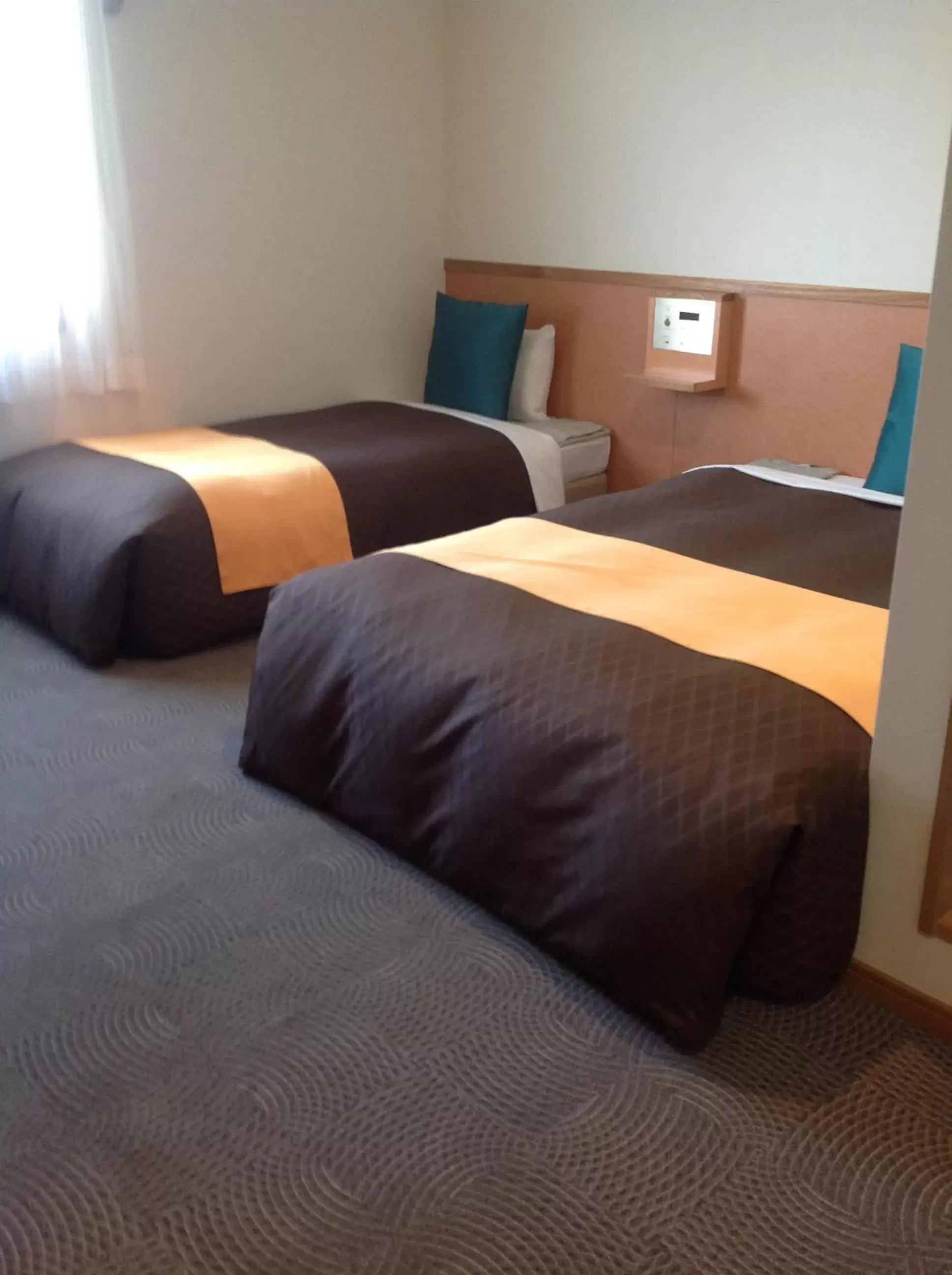 Bed in Hotel 1-2-3 Shimada