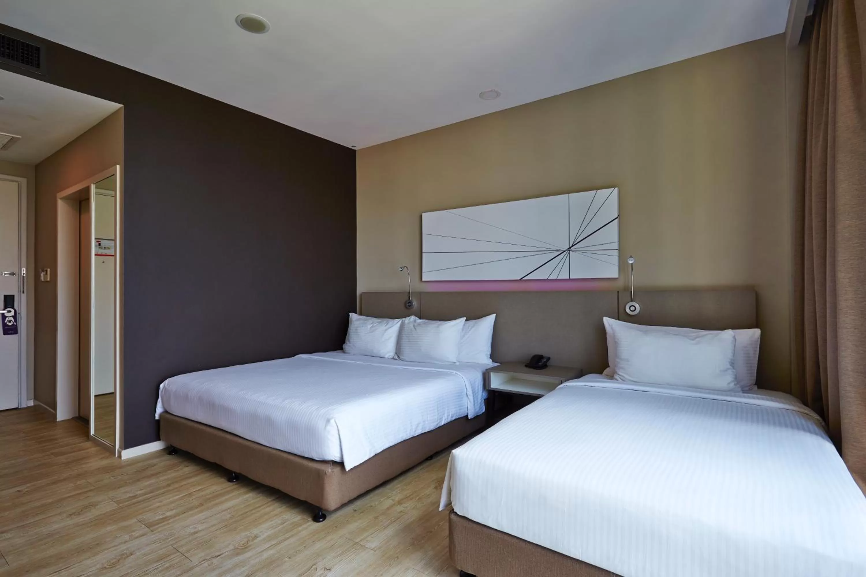 Bed in Qliq Damansara Hotel