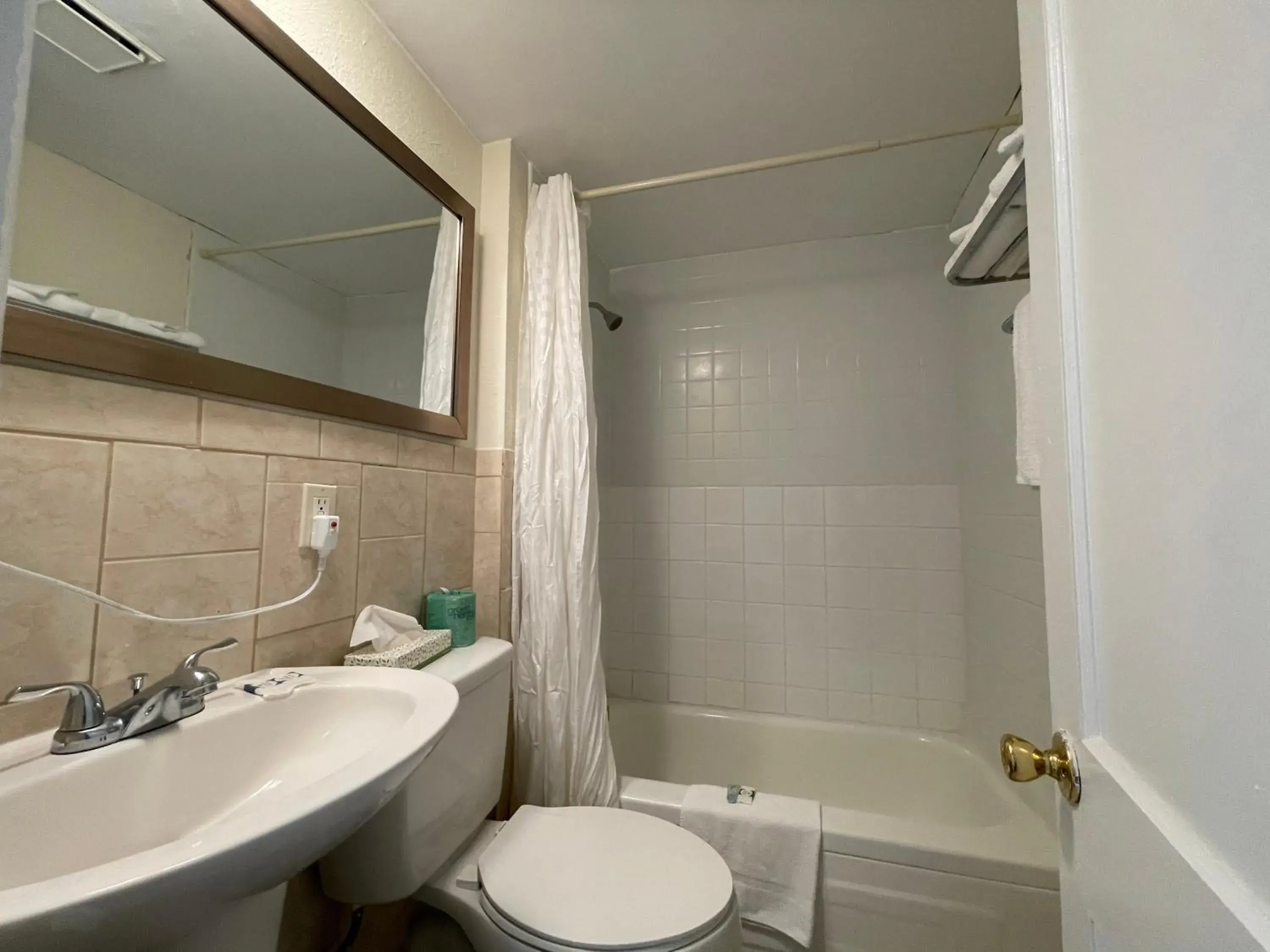 Bathroom in Wildwood Inn, a Travelodge by Wyndham
