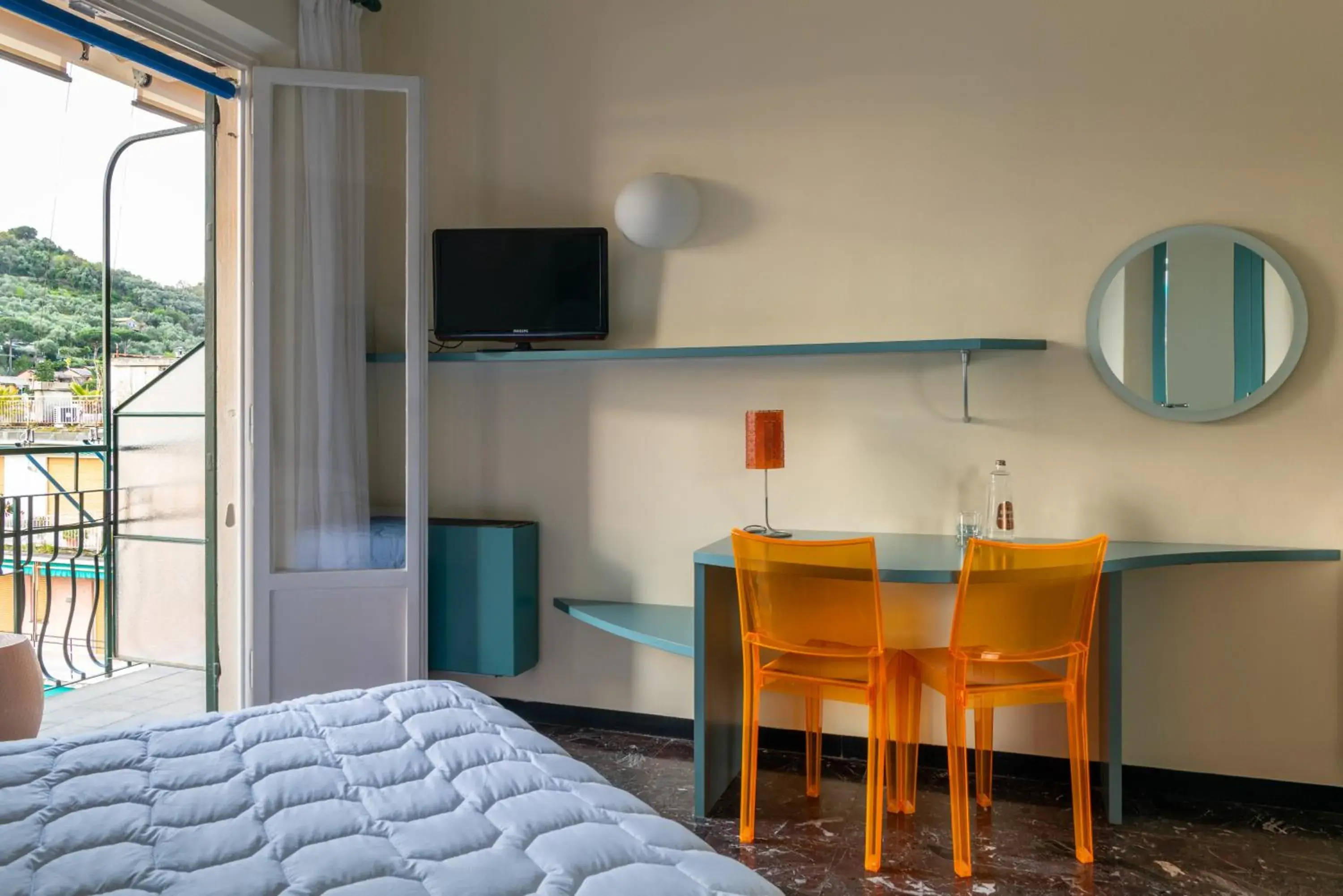 Bedroom, TV/Entertainment Center in Albergo Minerva