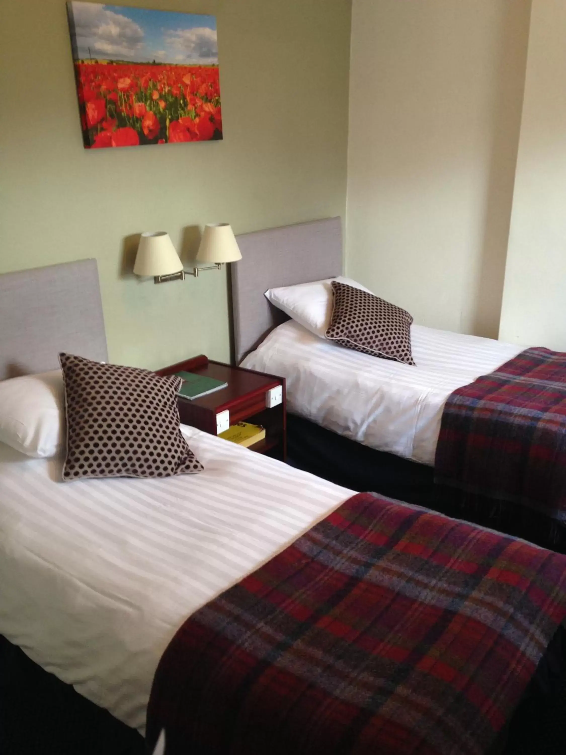 Bed in The Broadway Hotel