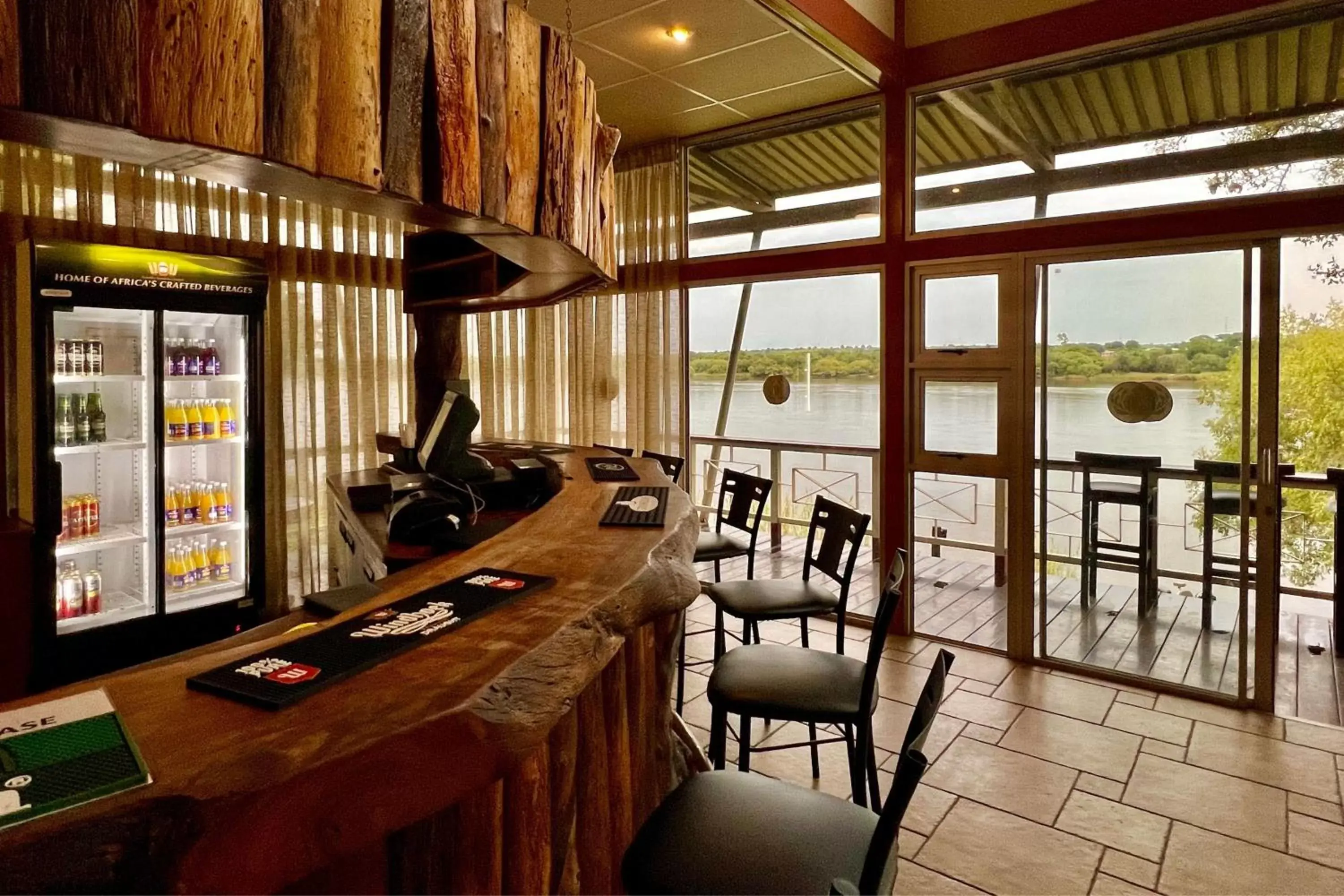 Lounge or bar in Protea Hotel by Marriott Zambezi River Lodge