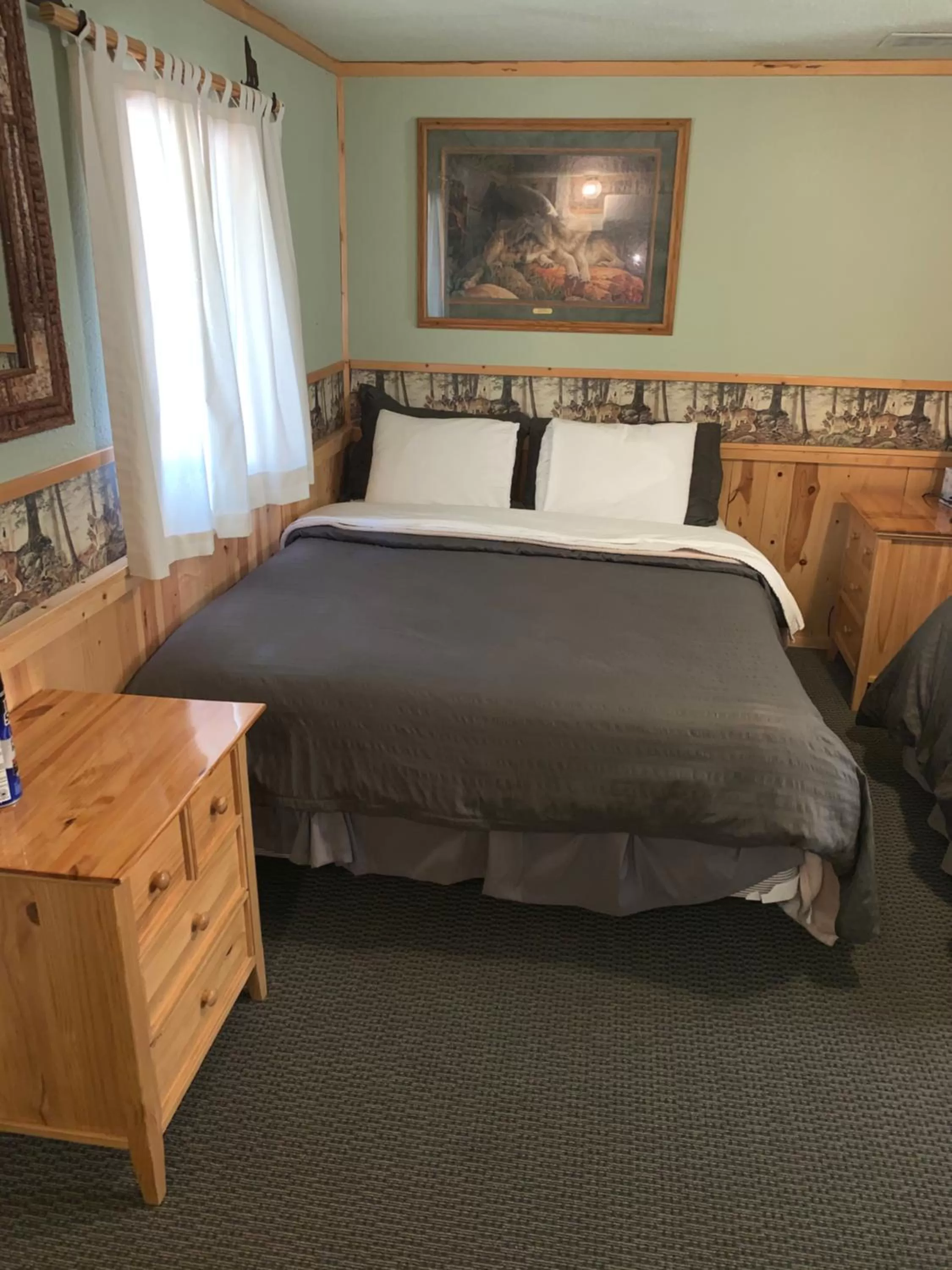 Bed in Glacier Haven Inn