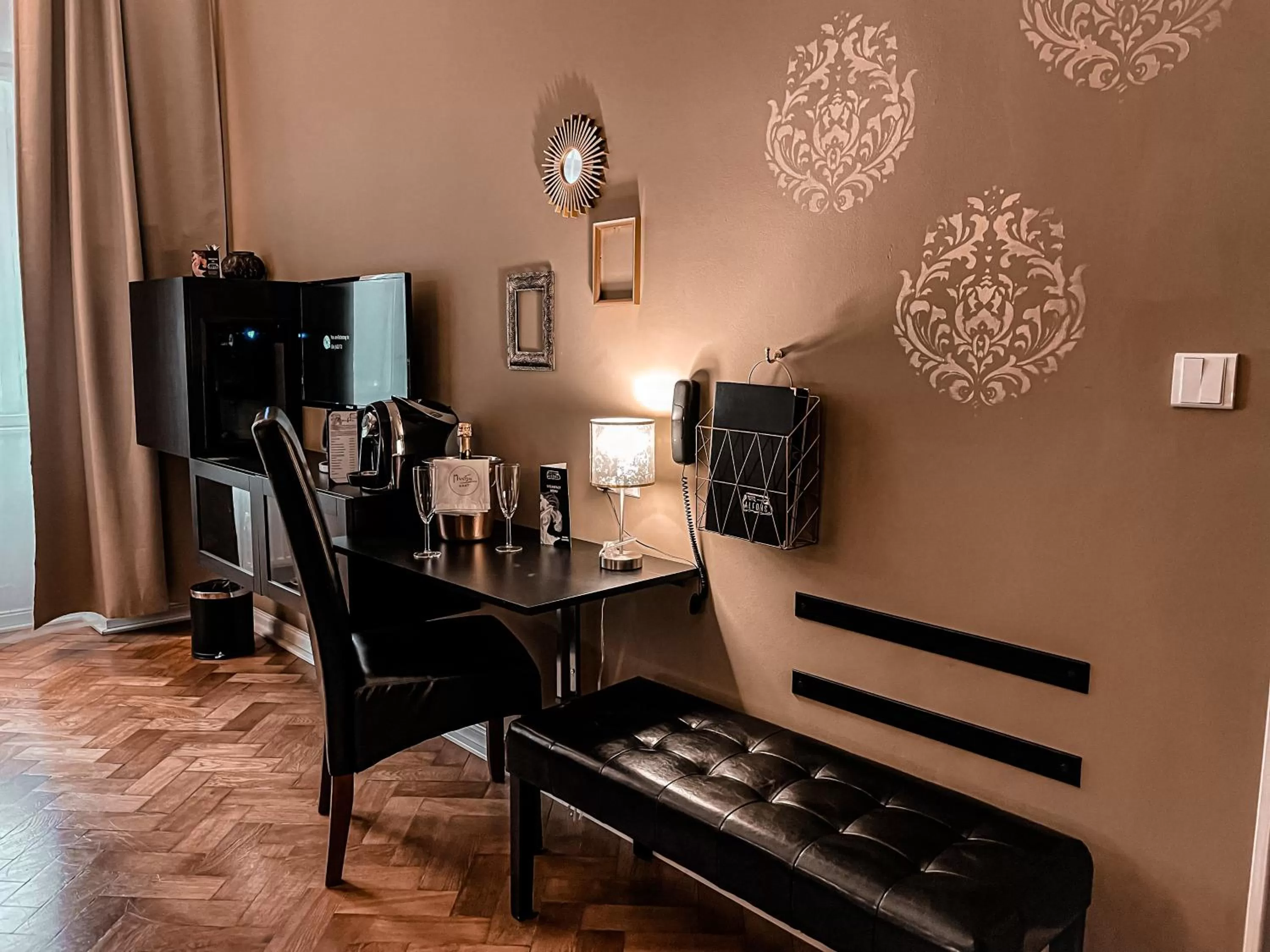 TV and multimedia in Alfons Boutique Hotel