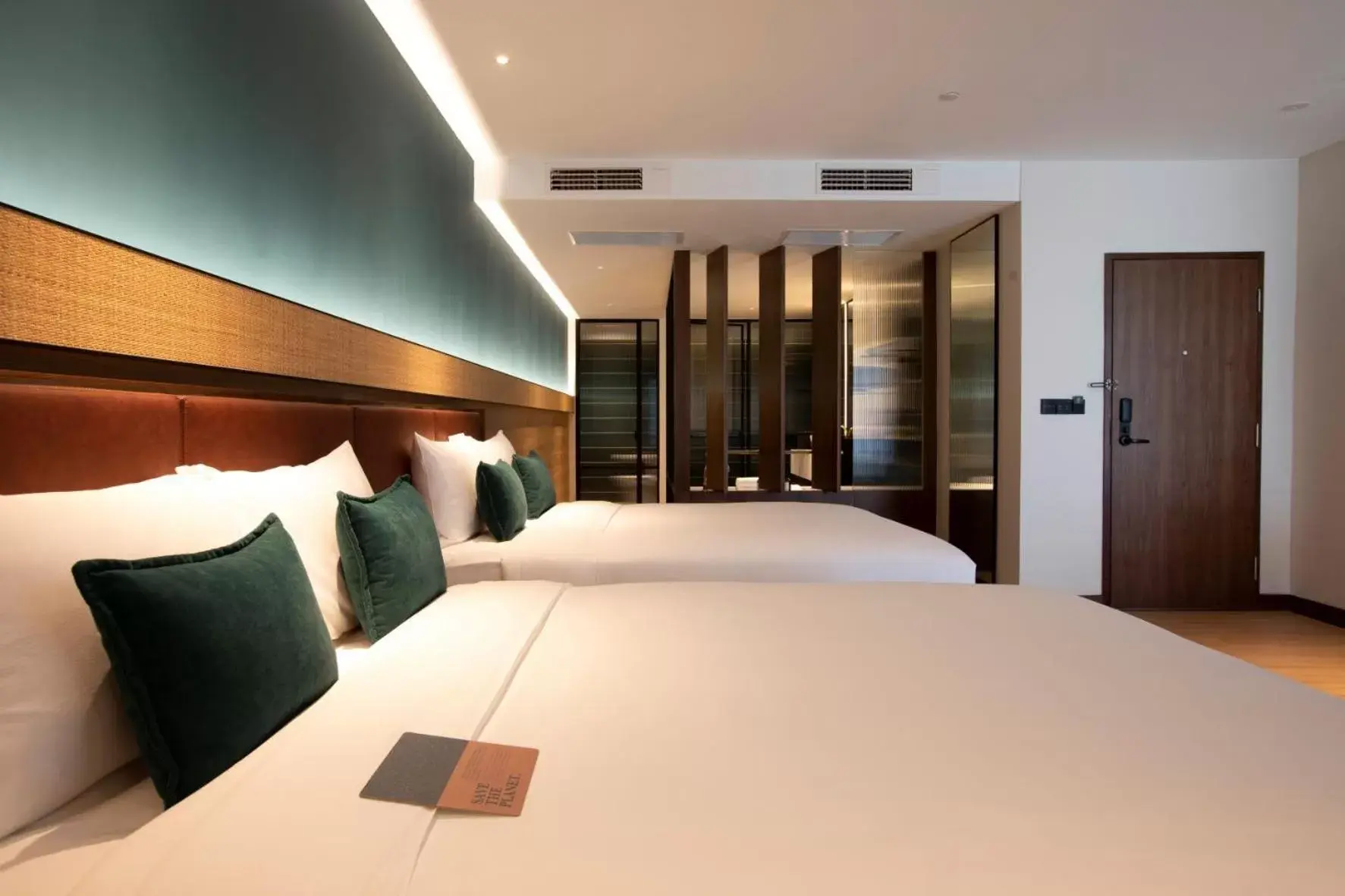 Bed in The LUMA Hotel, a Member of Design Hotels