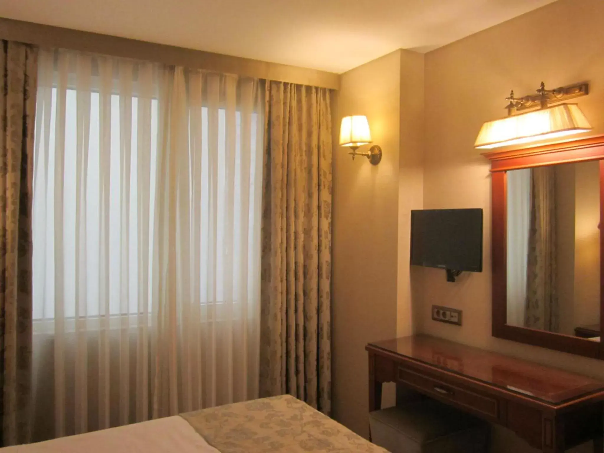 Bedroom, TV/Entertainment Center in Hotel Perula