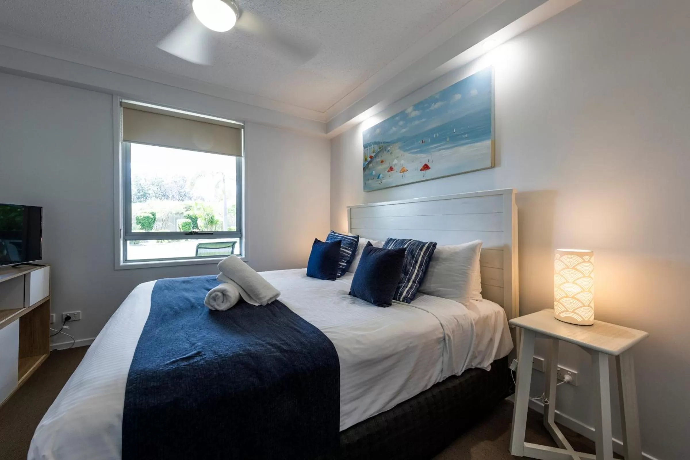 Bed in Pacific Marina Apartments