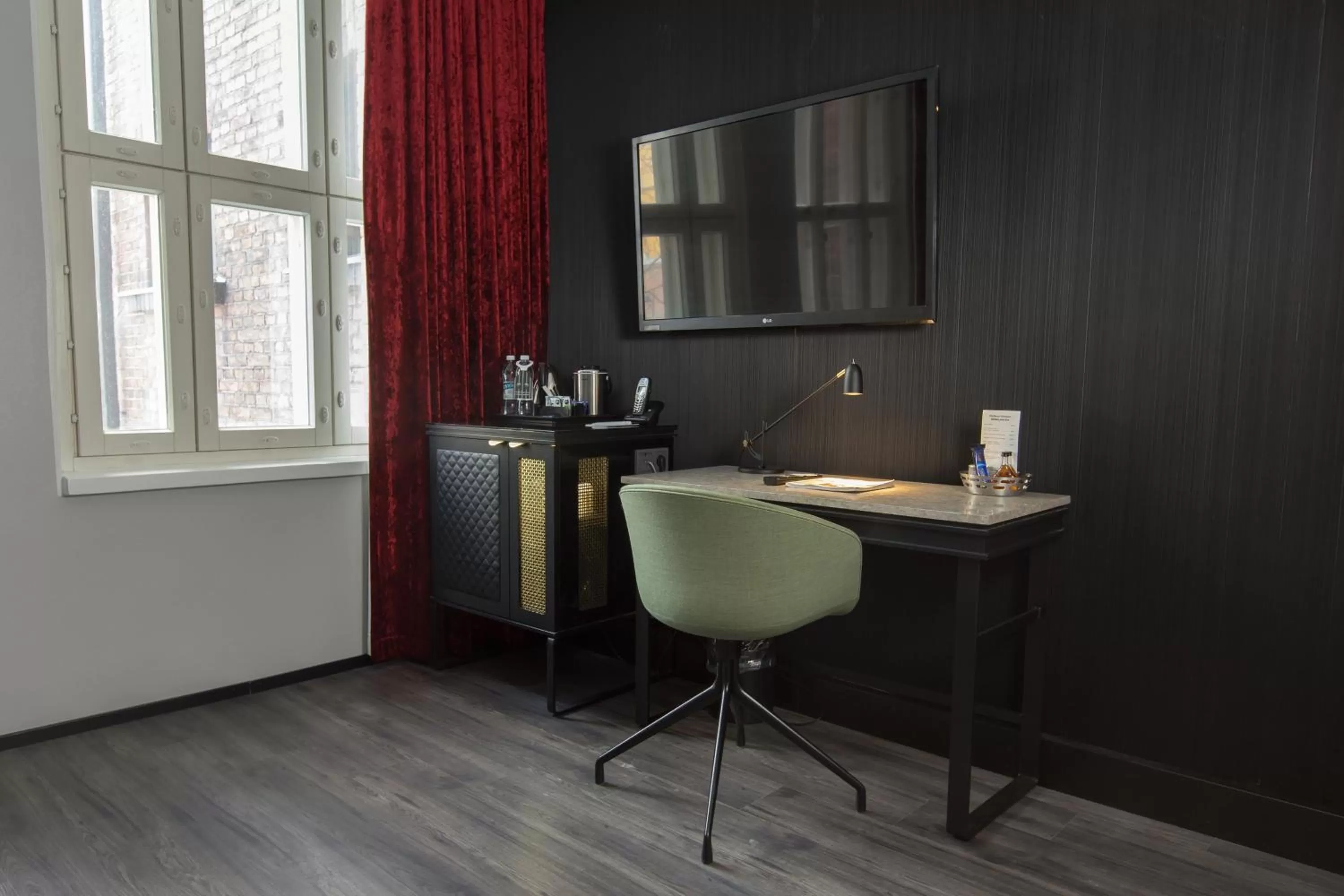 TV and multimedia in Hotel Katajanokka, Helsinki, a Tribute Portfolio Hotel