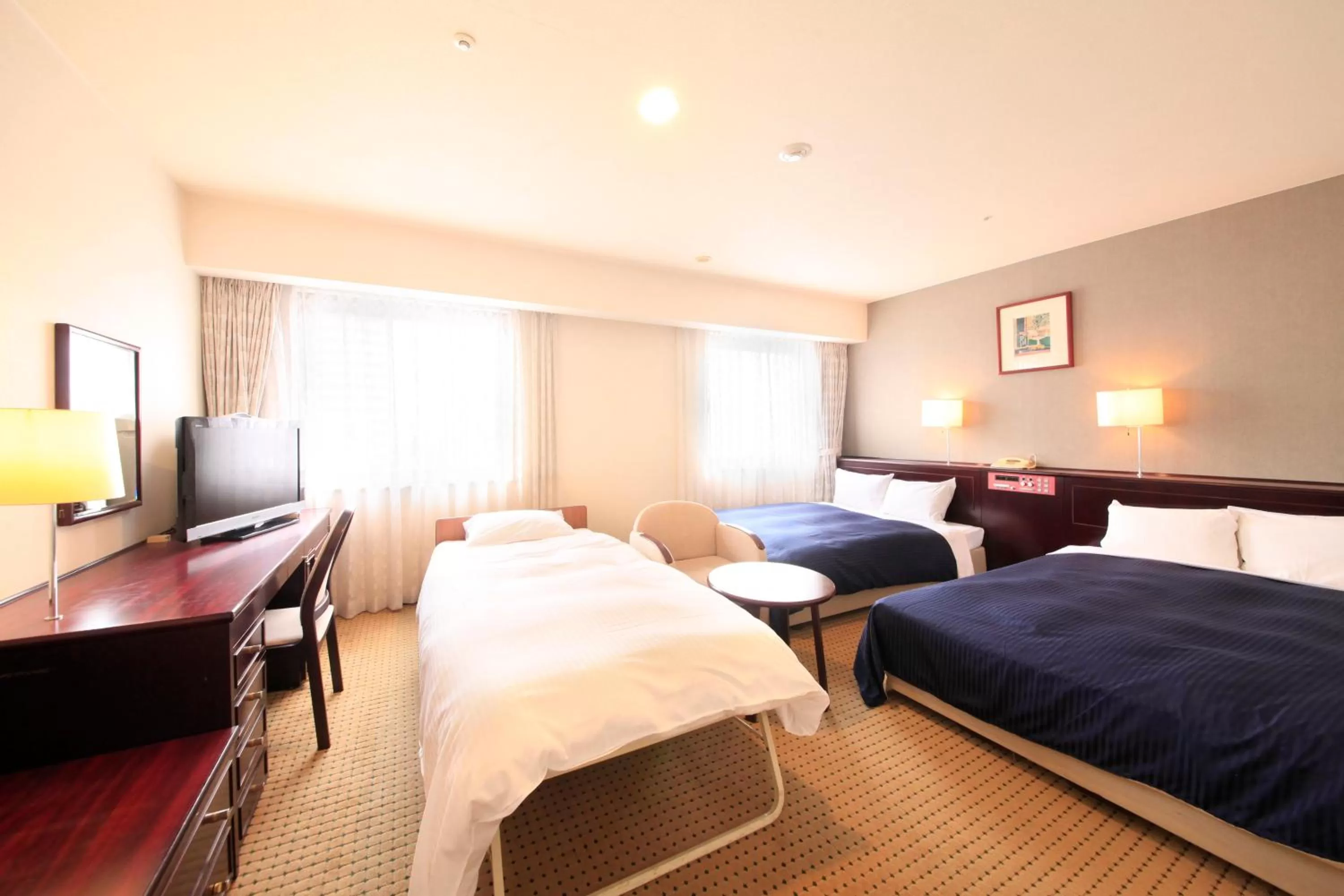 Photo of the whole room, Bed in Quintessa Hotel Ogaki