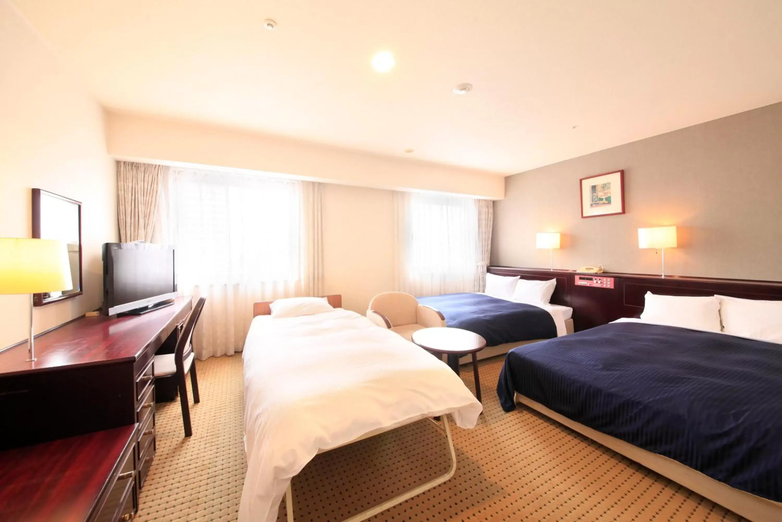 Photo of the whole room, Bed in Quintessa Hotel Ogaki