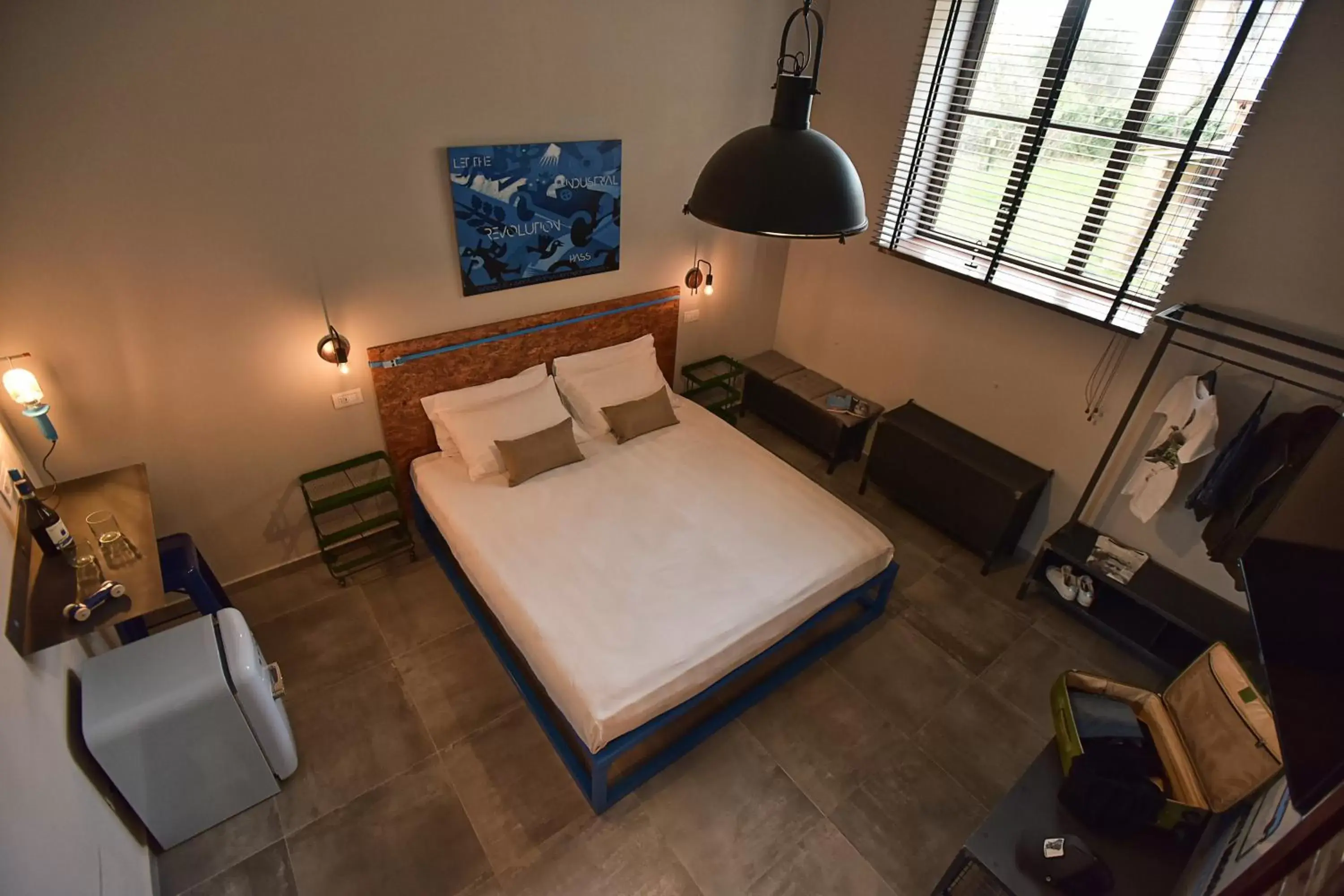 Bed in GARAGE47 Storica Officina Meccanica LOFT B&B iN PIENZA