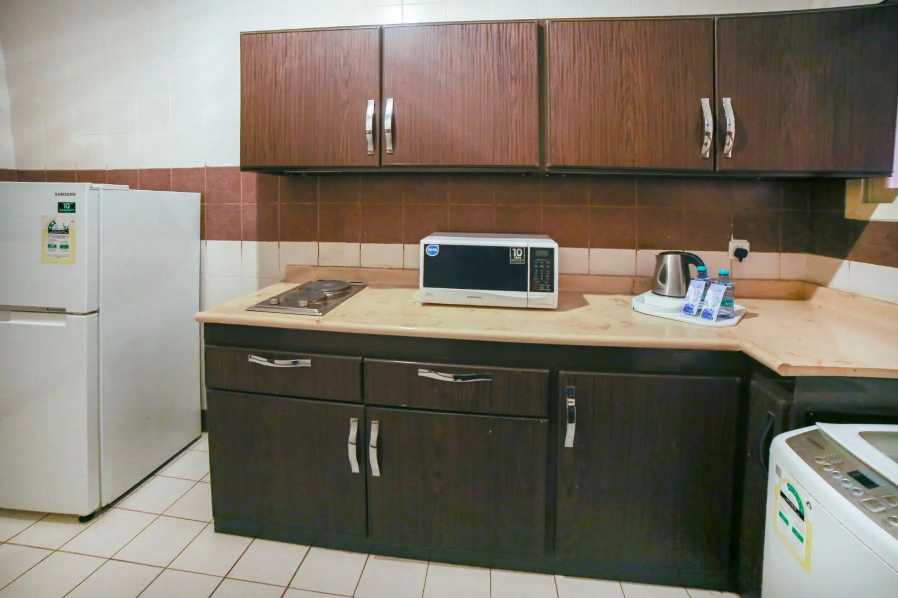 Kitchen or kitchenette, Kitchen/Kitchenette in OYO 401 Al Zaidan For Furnished Units